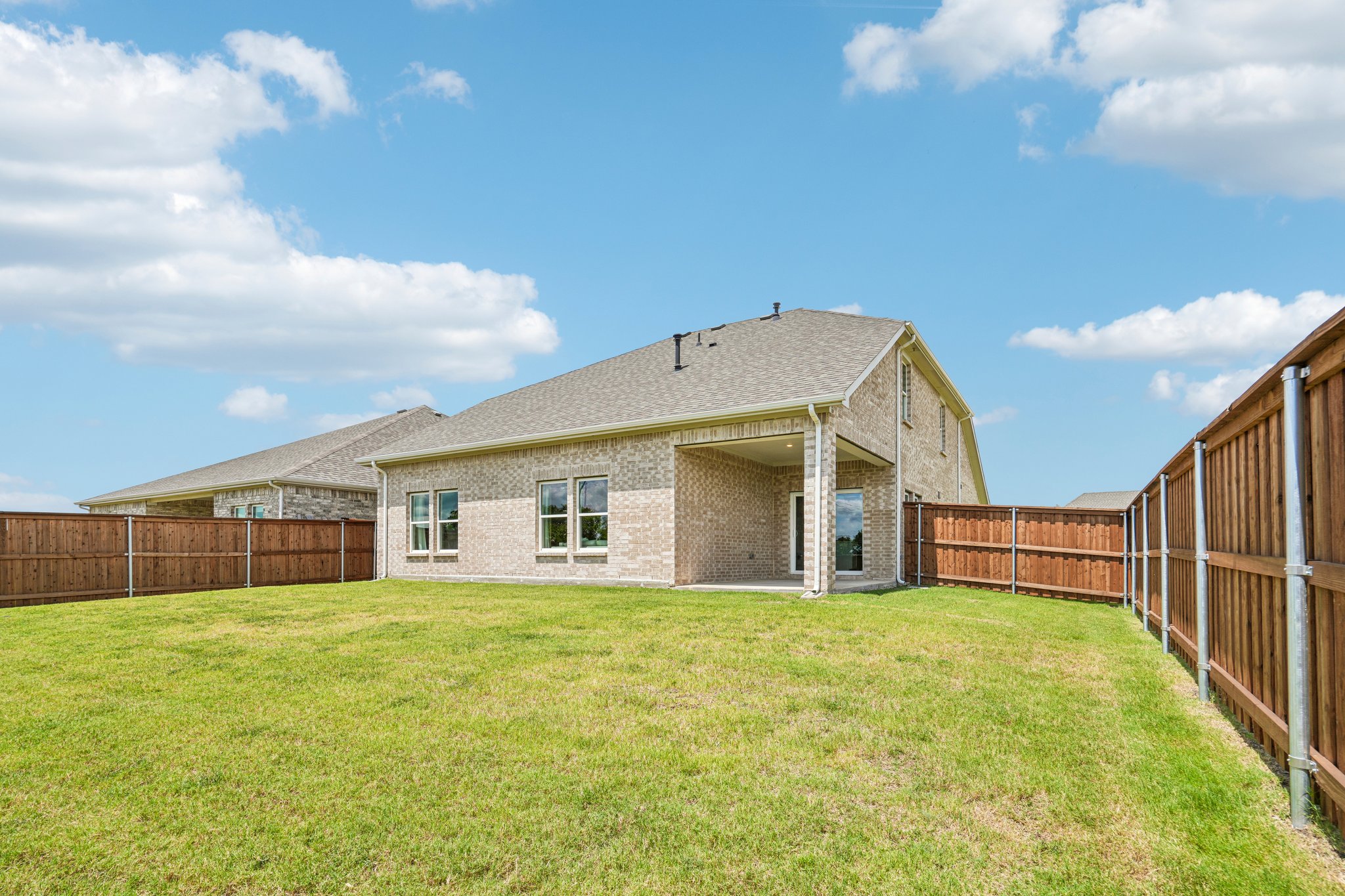 A house with a fence around it.