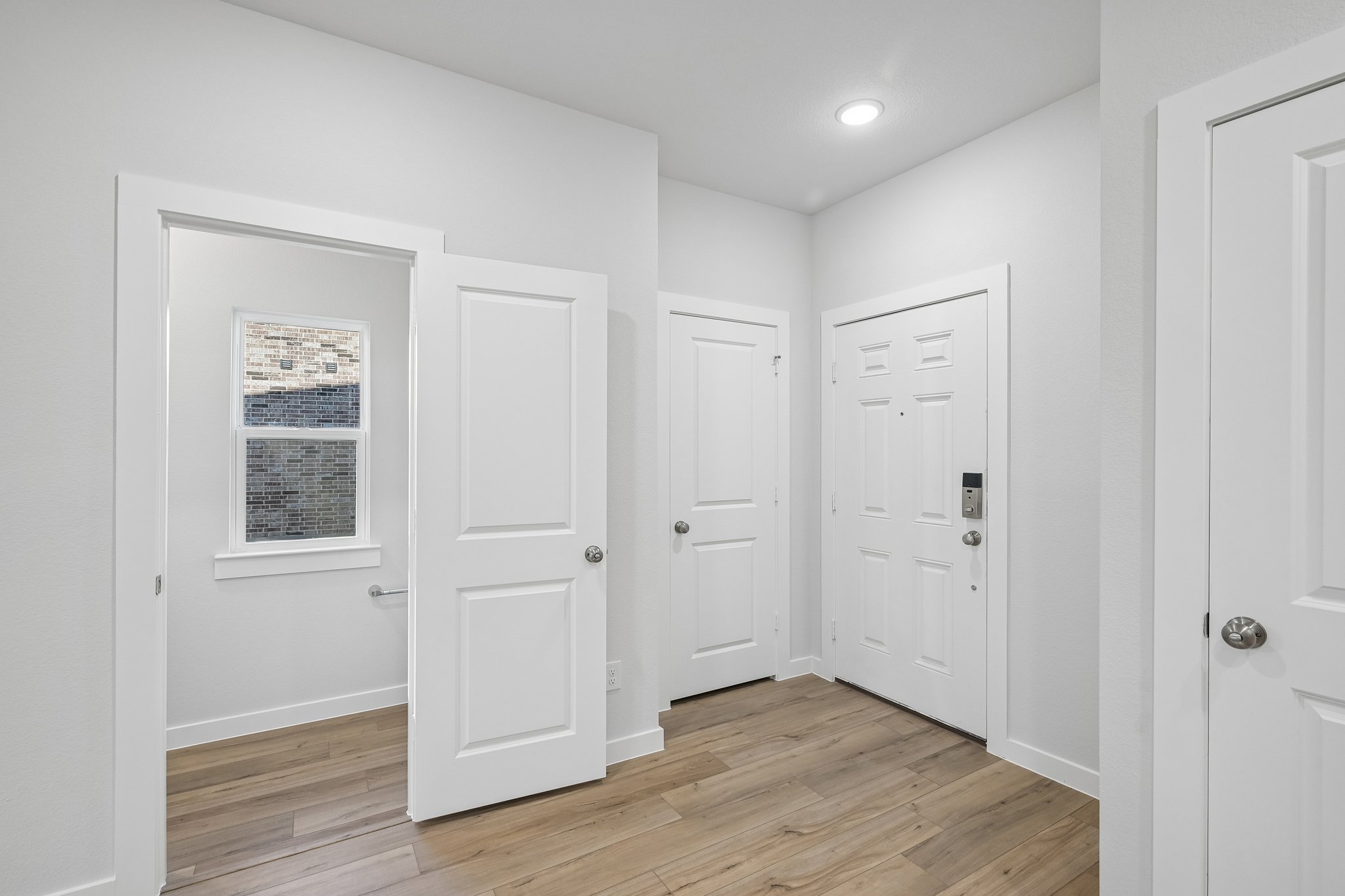 A room with white doors.