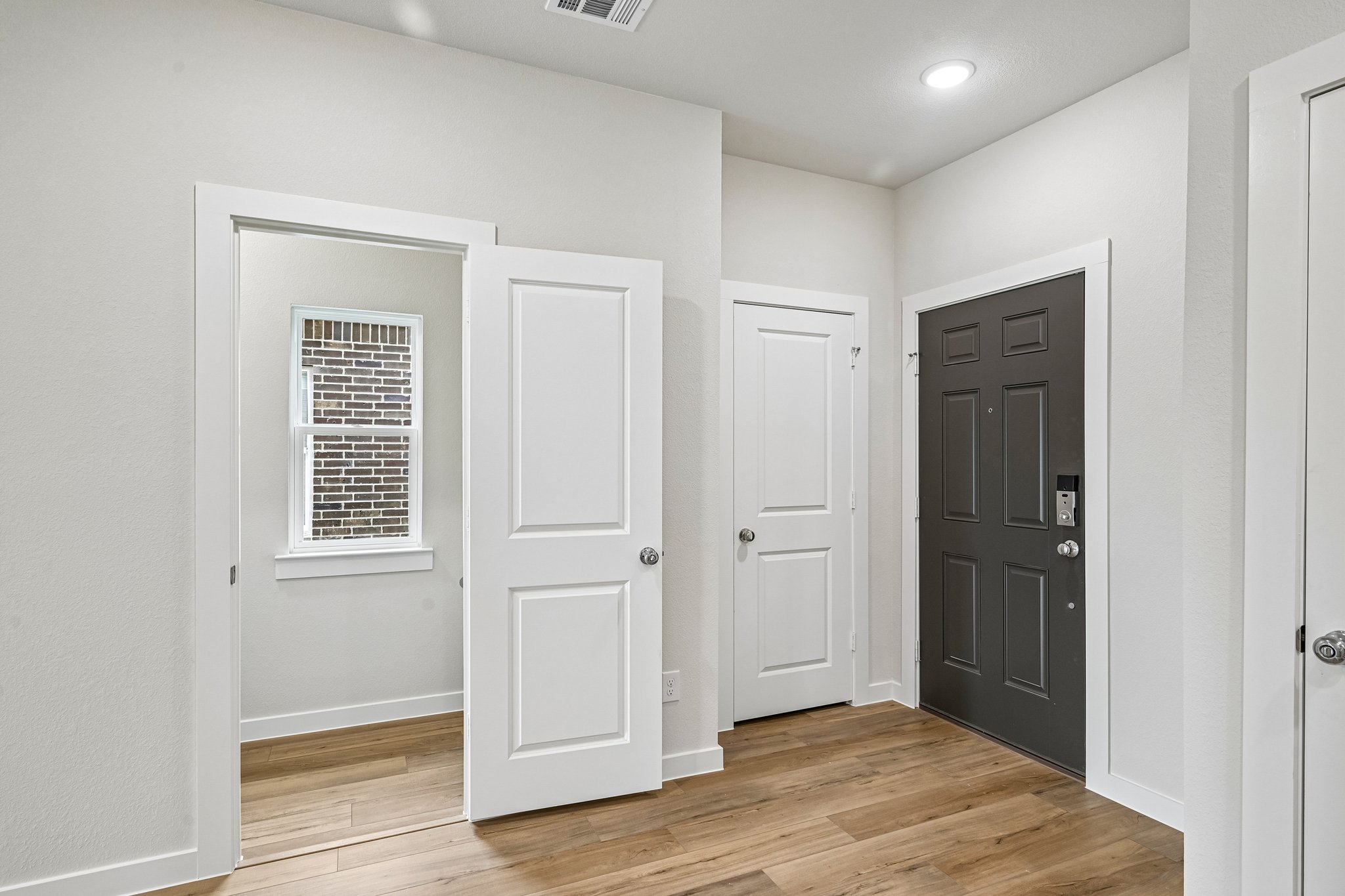 A room with white doors.