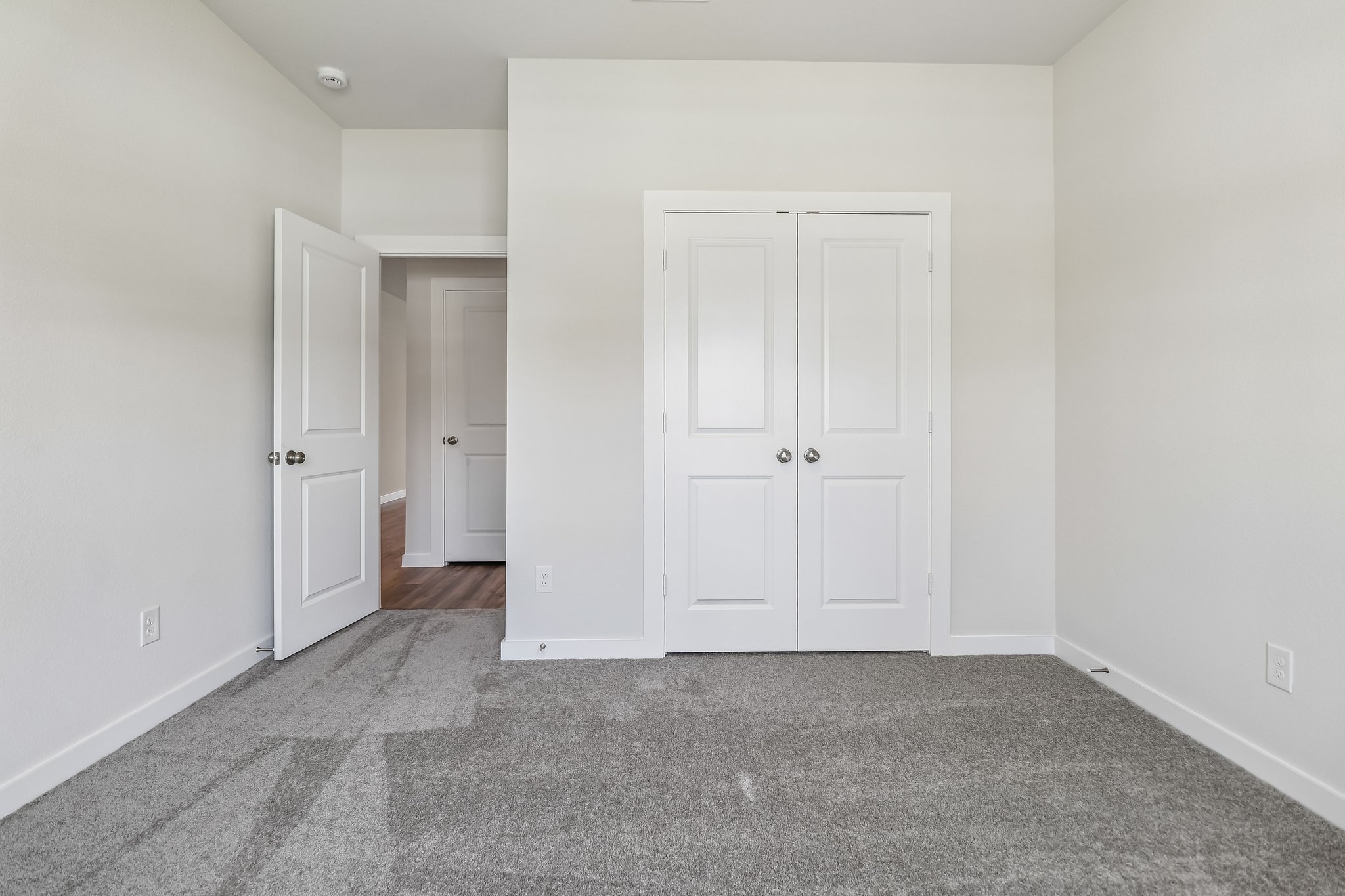 A room with white doors.