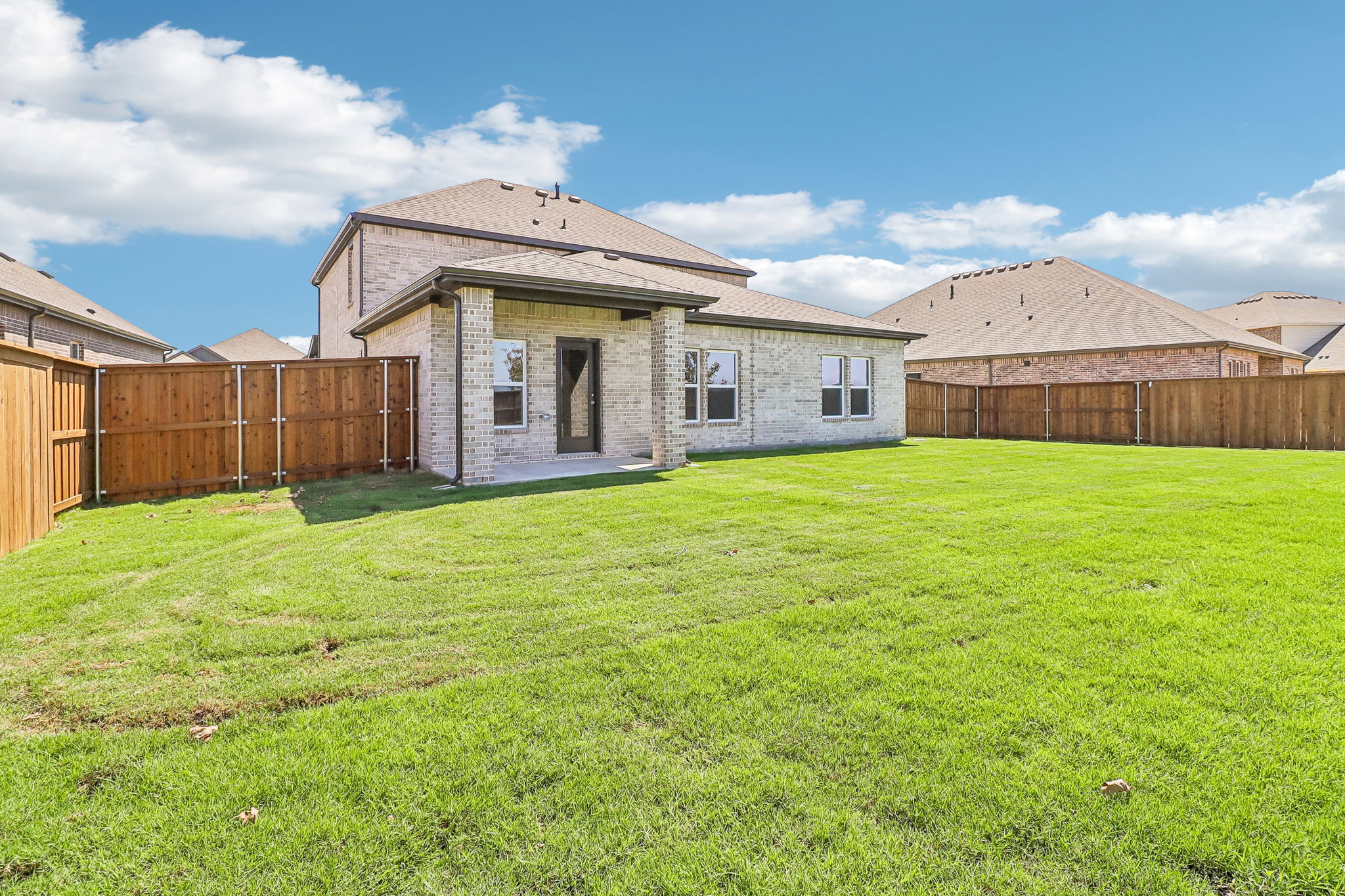 A house with a fence around it.