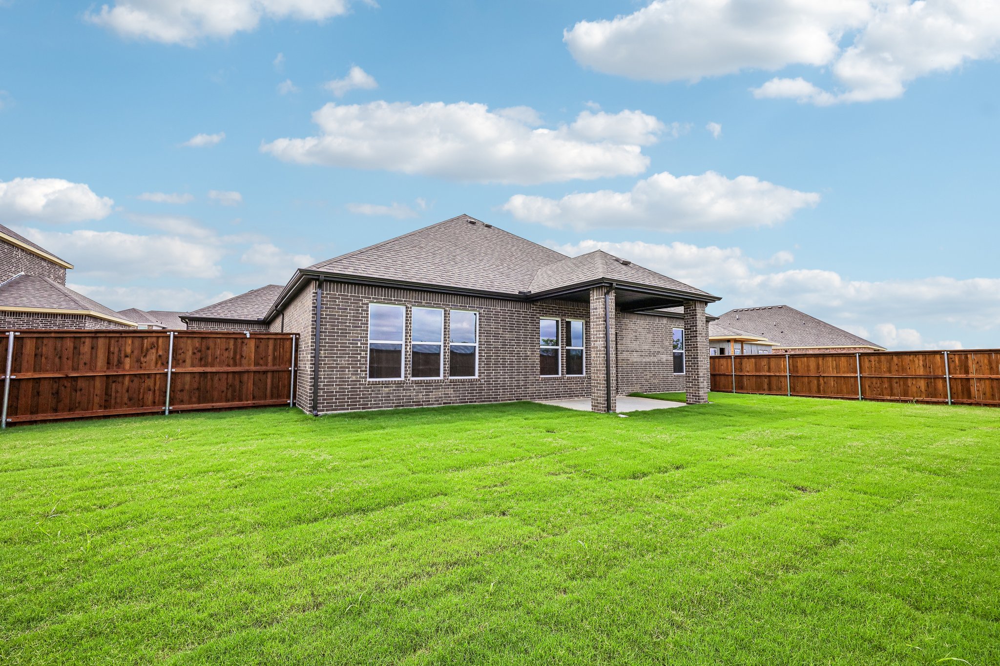 A house with a fence around it.