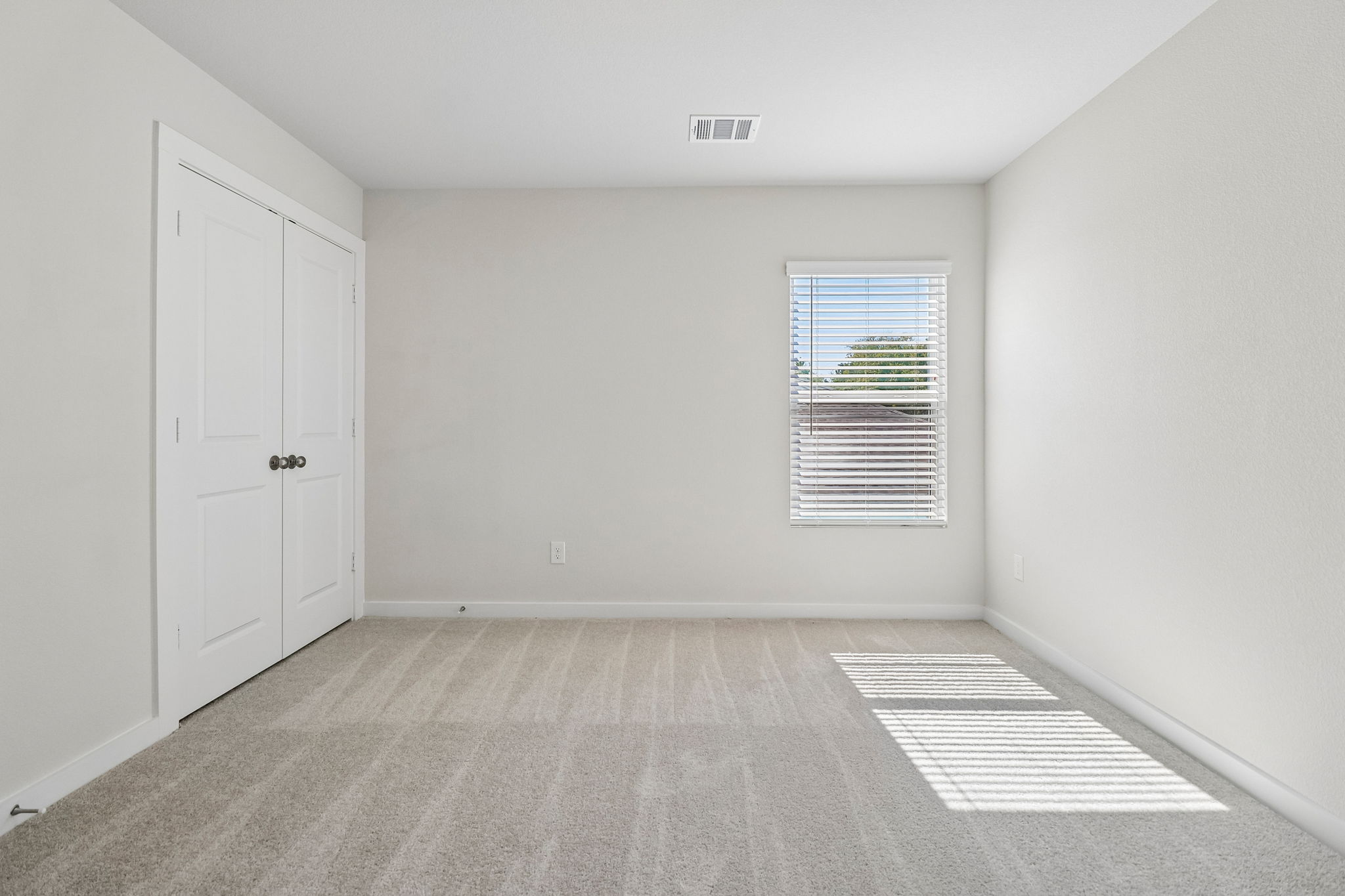 A room with white doors.