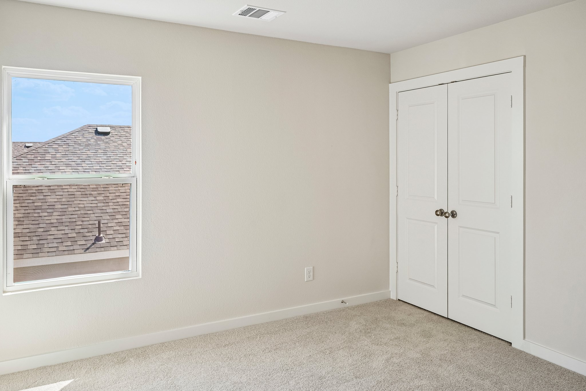 A room with white doors.