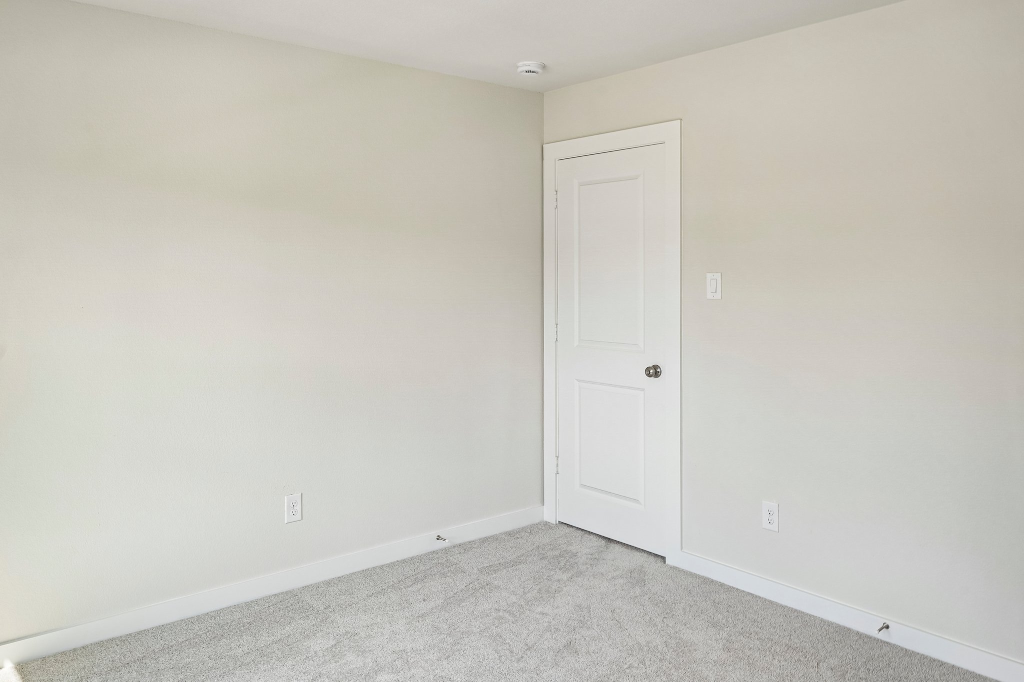 A white door in a room.