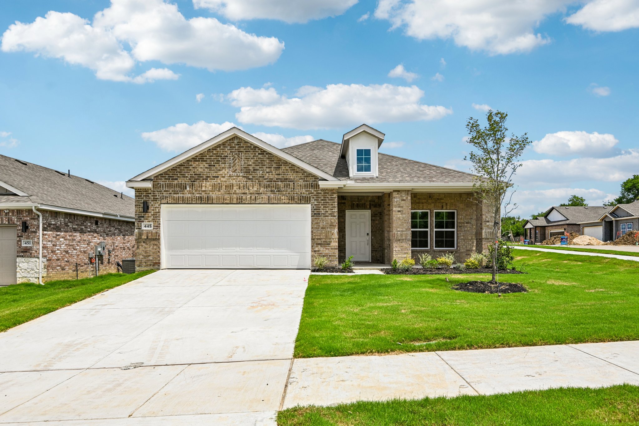 A house with a driveway.