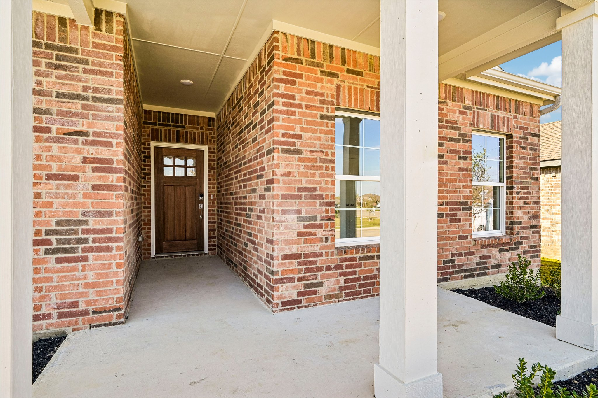 A brick building with a door.