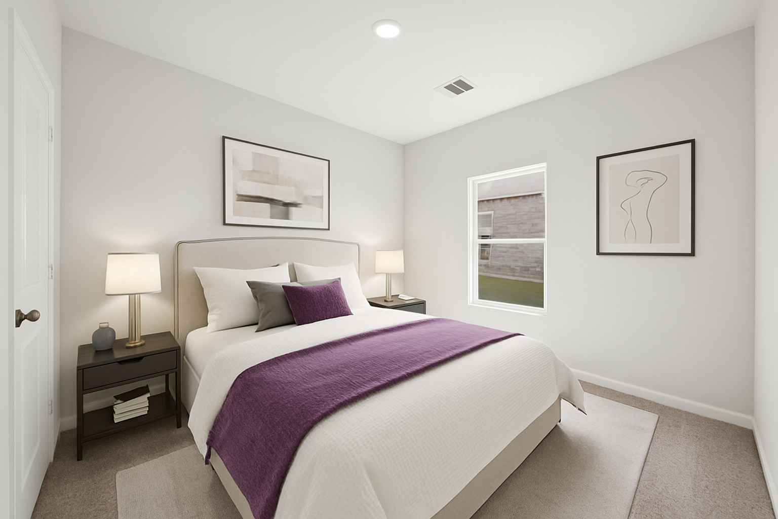 A bedroom with a bed and lamps.