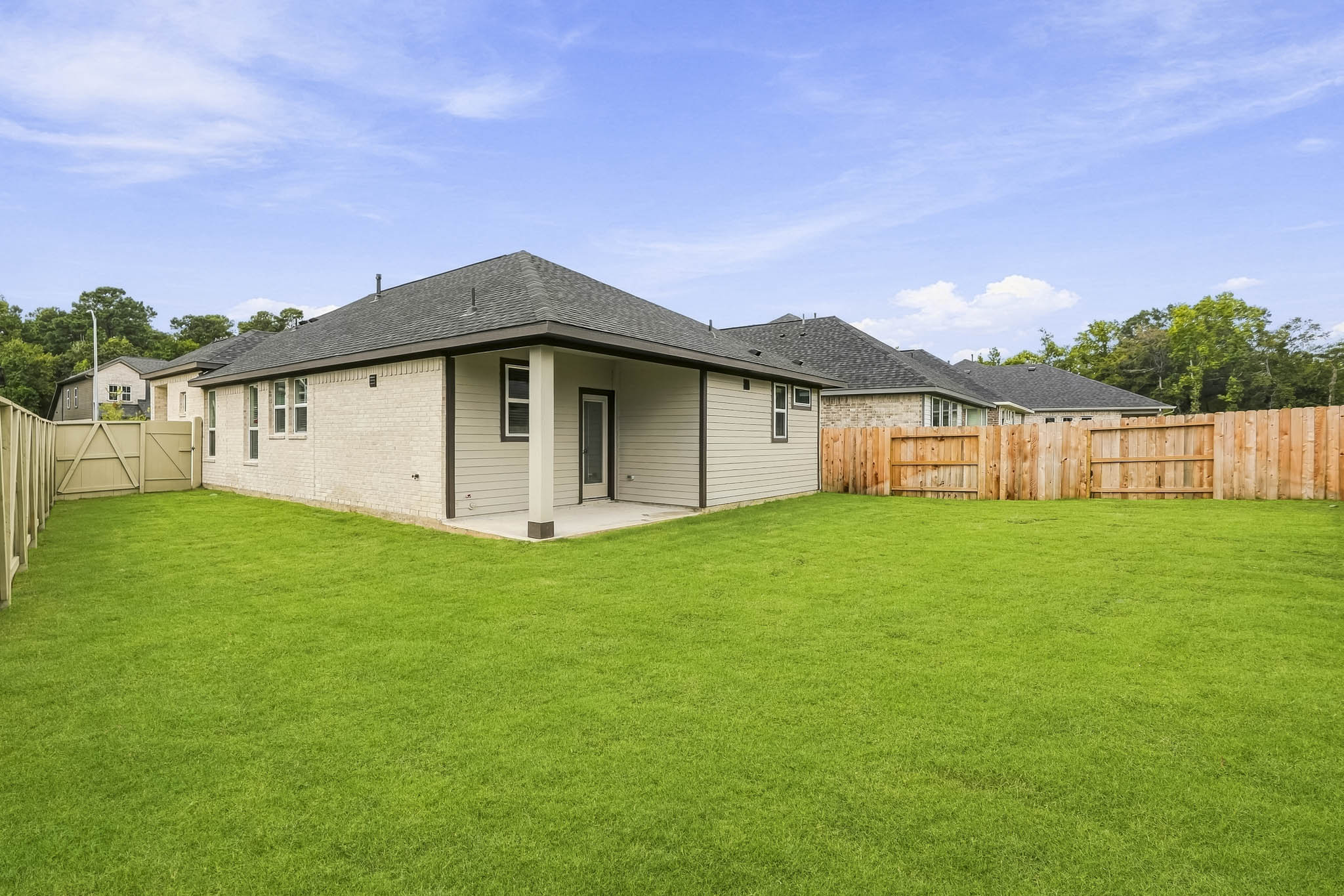 A house with a fence around it.