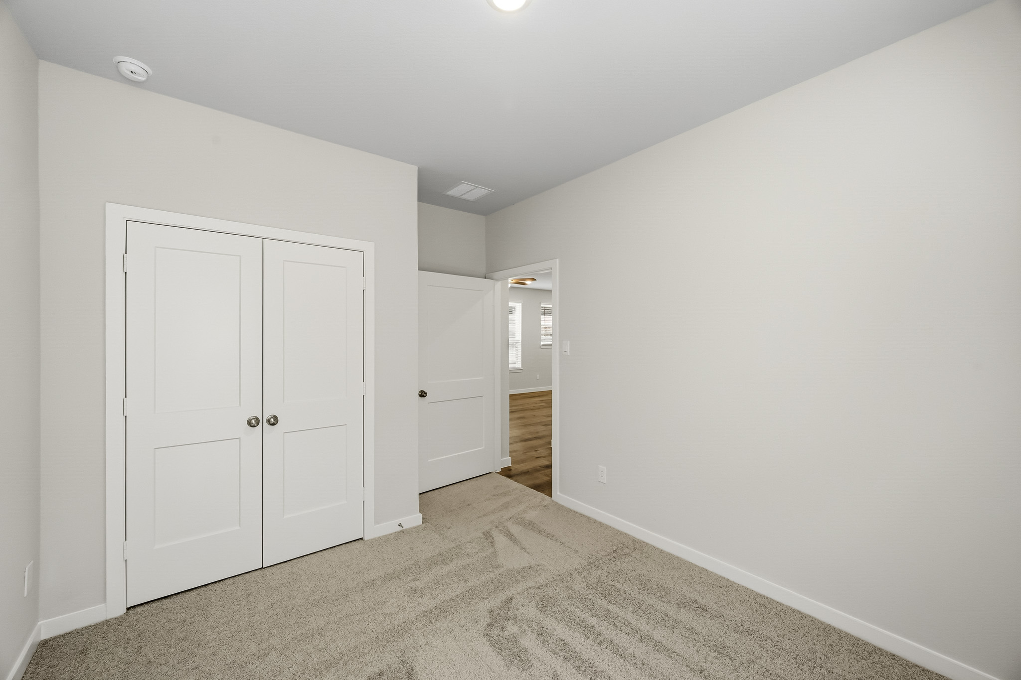 A room with white doors.