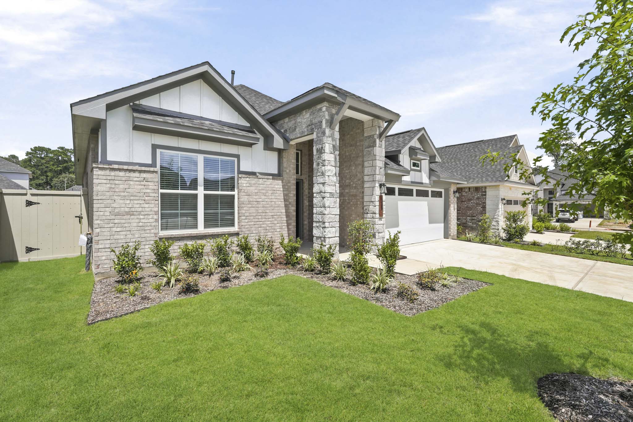 A house with a large front yard.