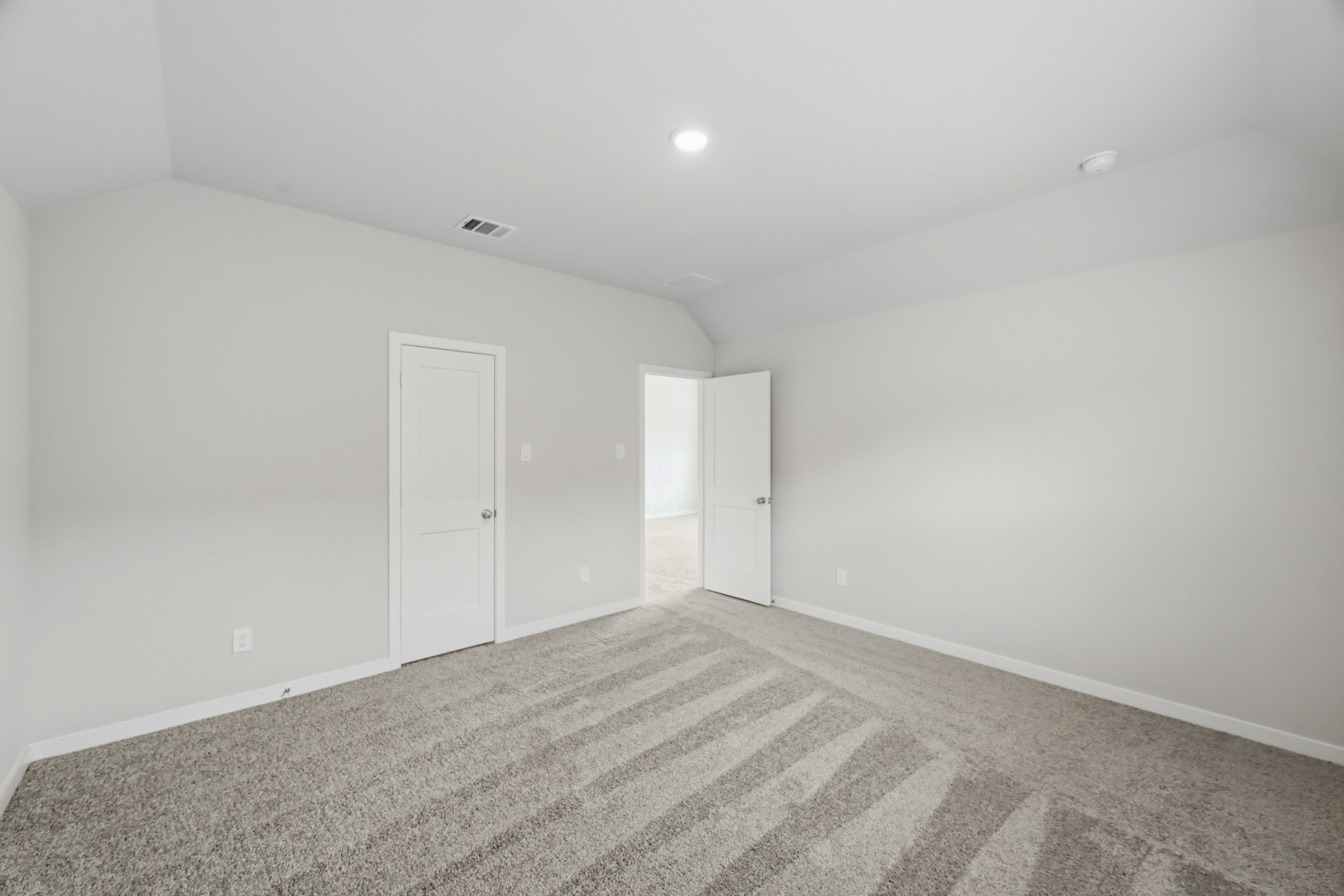 A room with white doors.