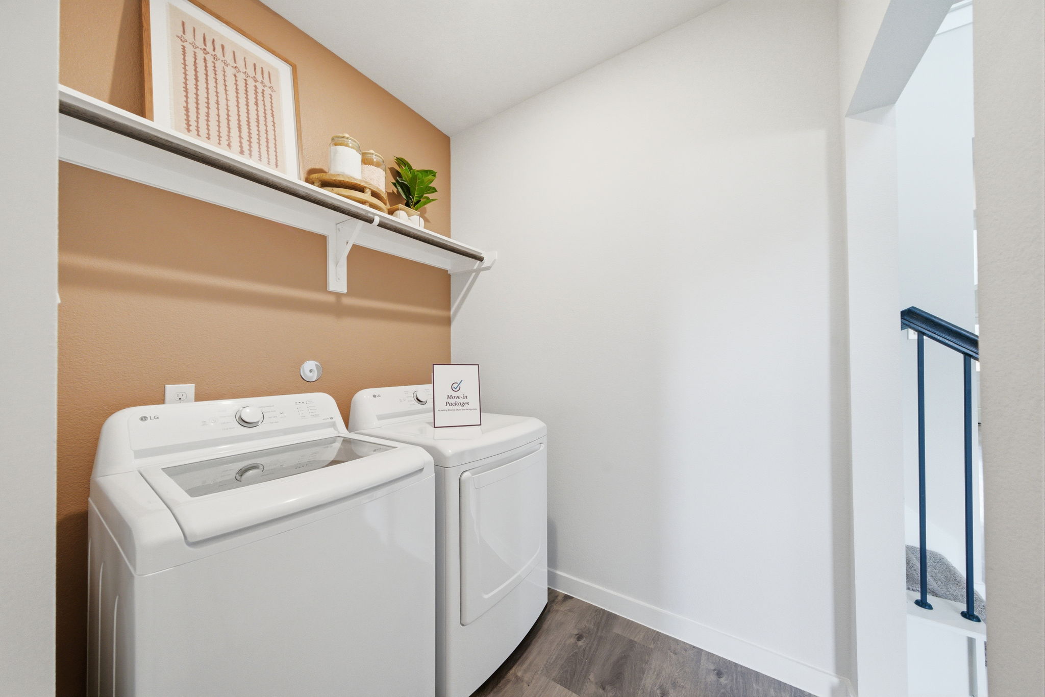 A laundry room with a washer and dryer.
