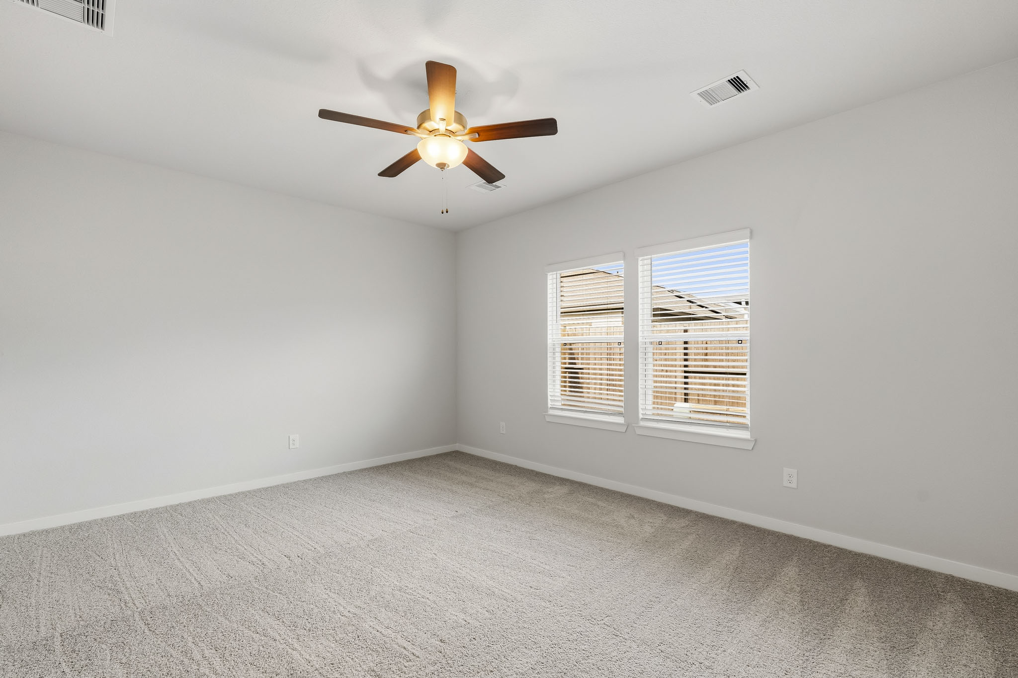 A ceiling fan in a room.