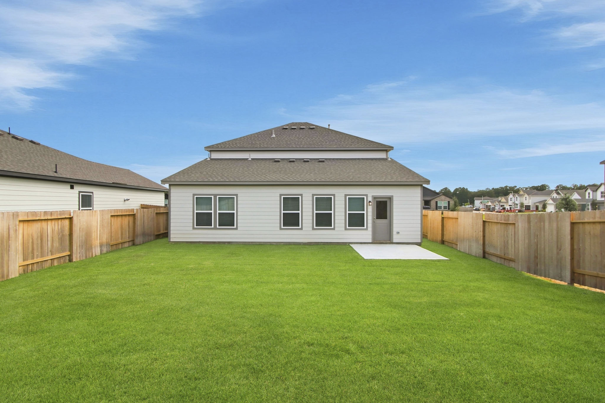 A house with a fence around it.