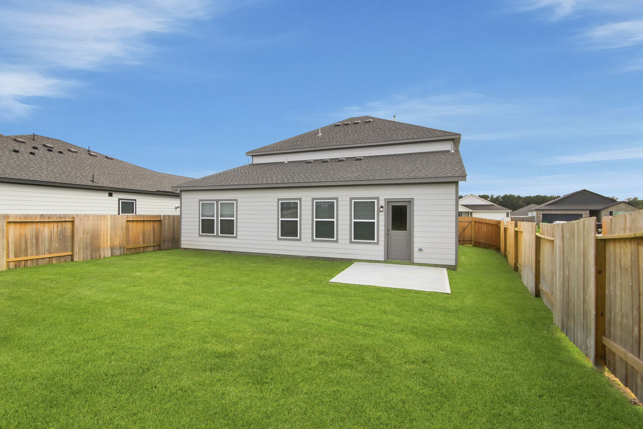 A house with a fence around it.