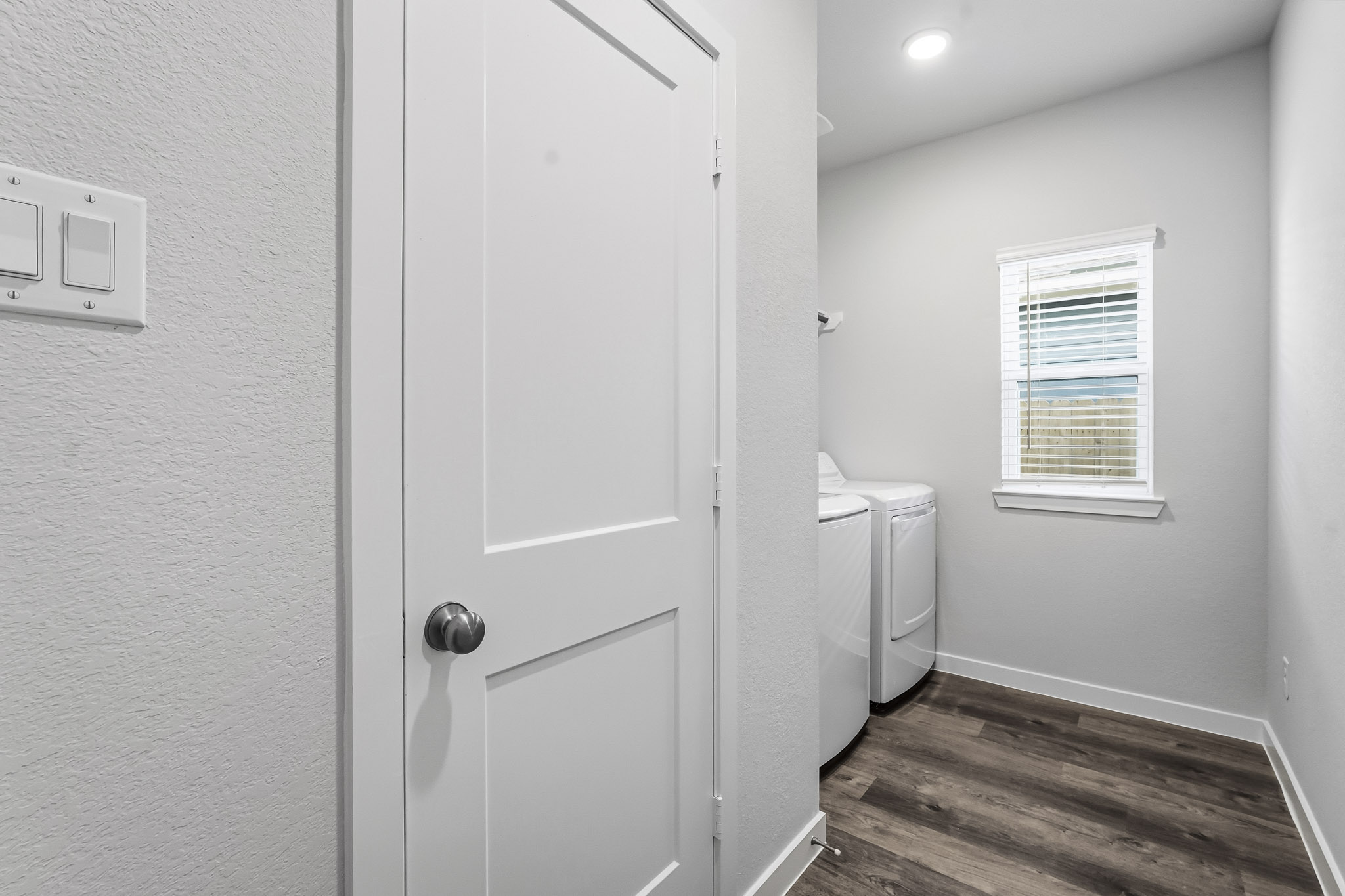 A white door in a room.