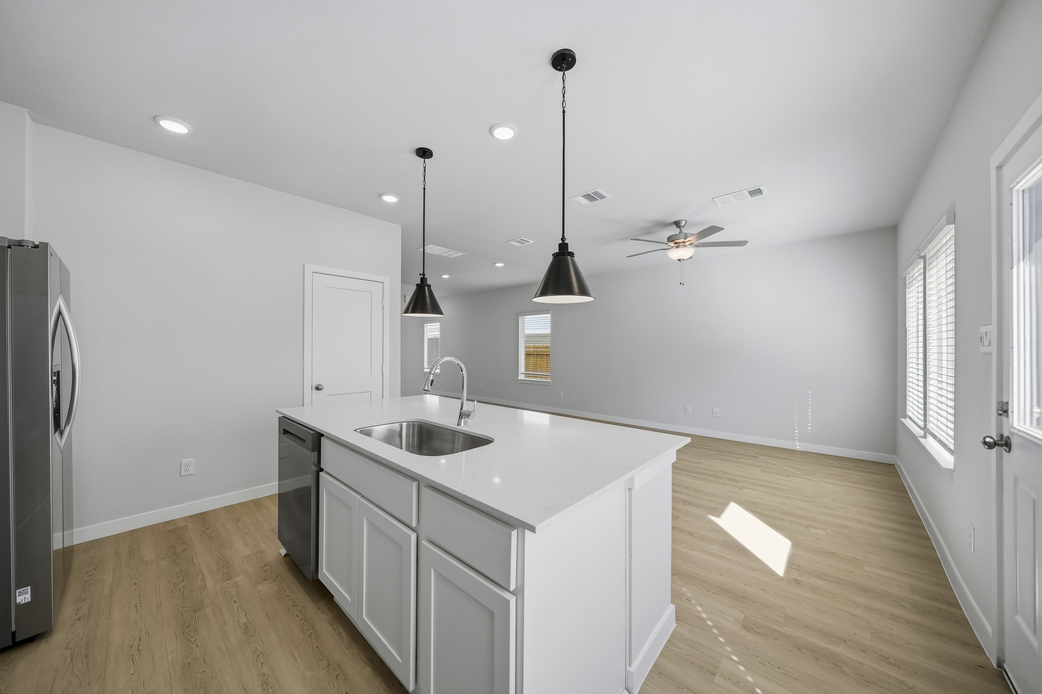 A kitchen with a sink and a countertop.