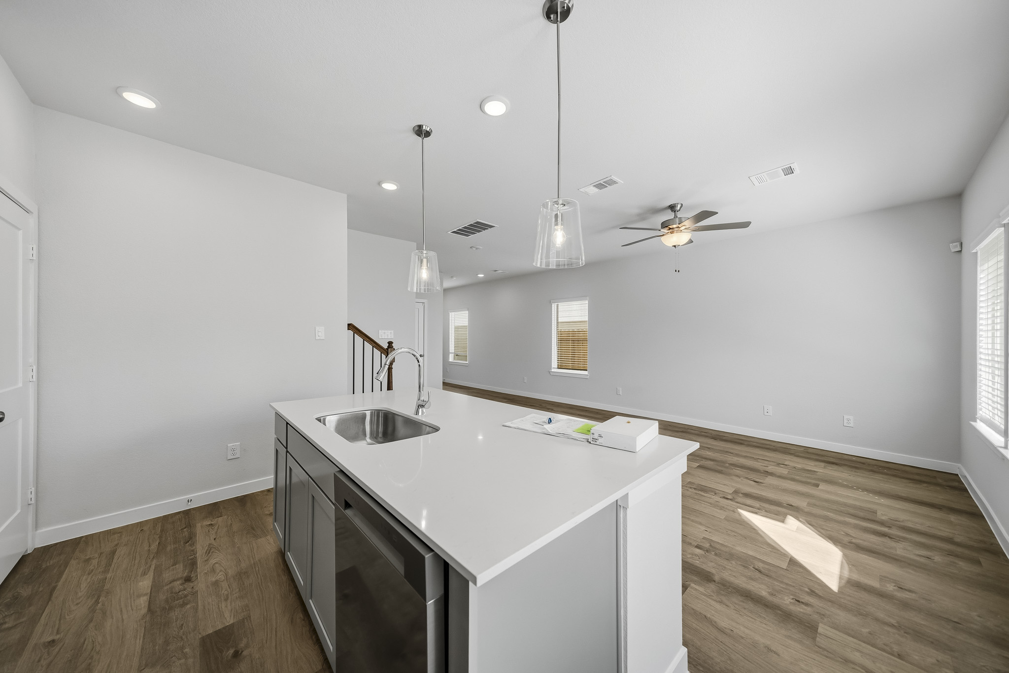 A kitchen with a sink and a countertop.