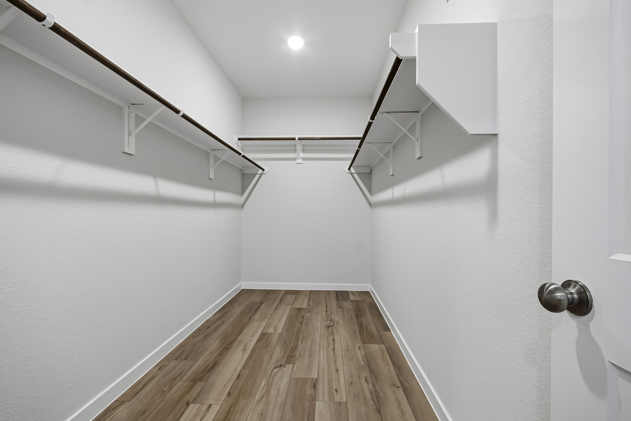A wooden floor in a room.