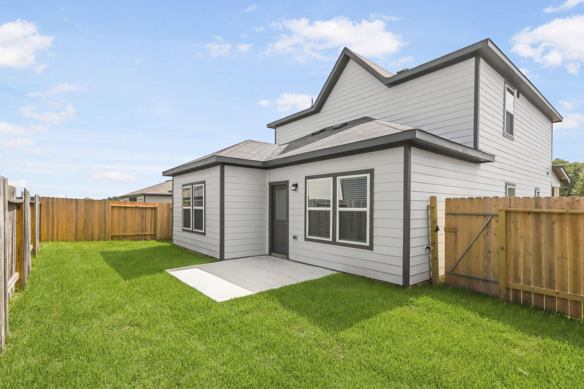 A house with a fence around it.
