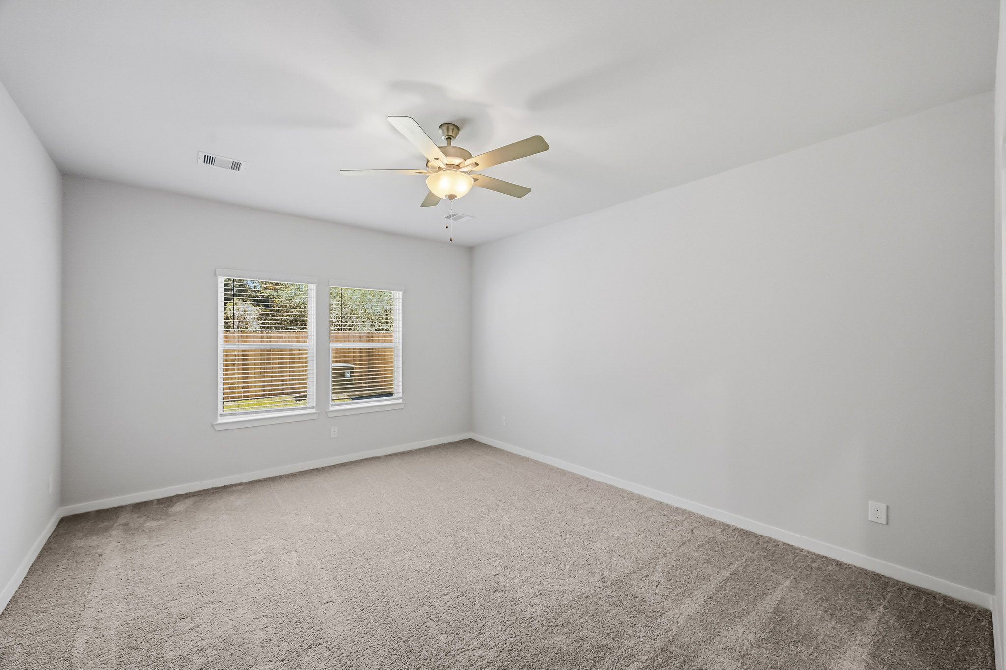 A ceiling fan in a room.