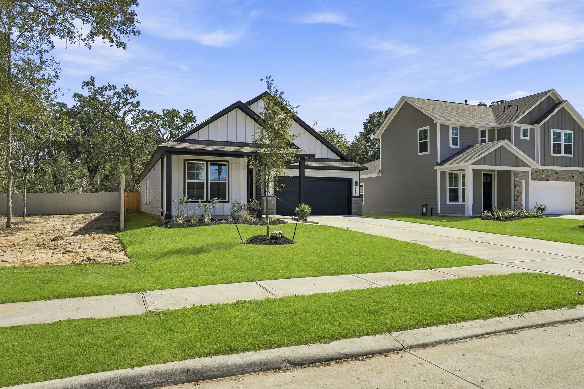 A house with a lawn and trees.
