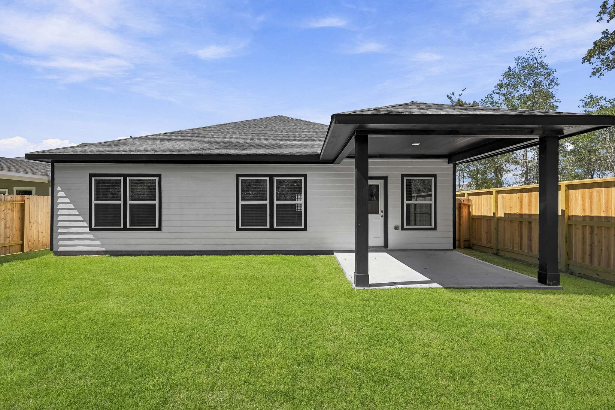A house with a fence around it.