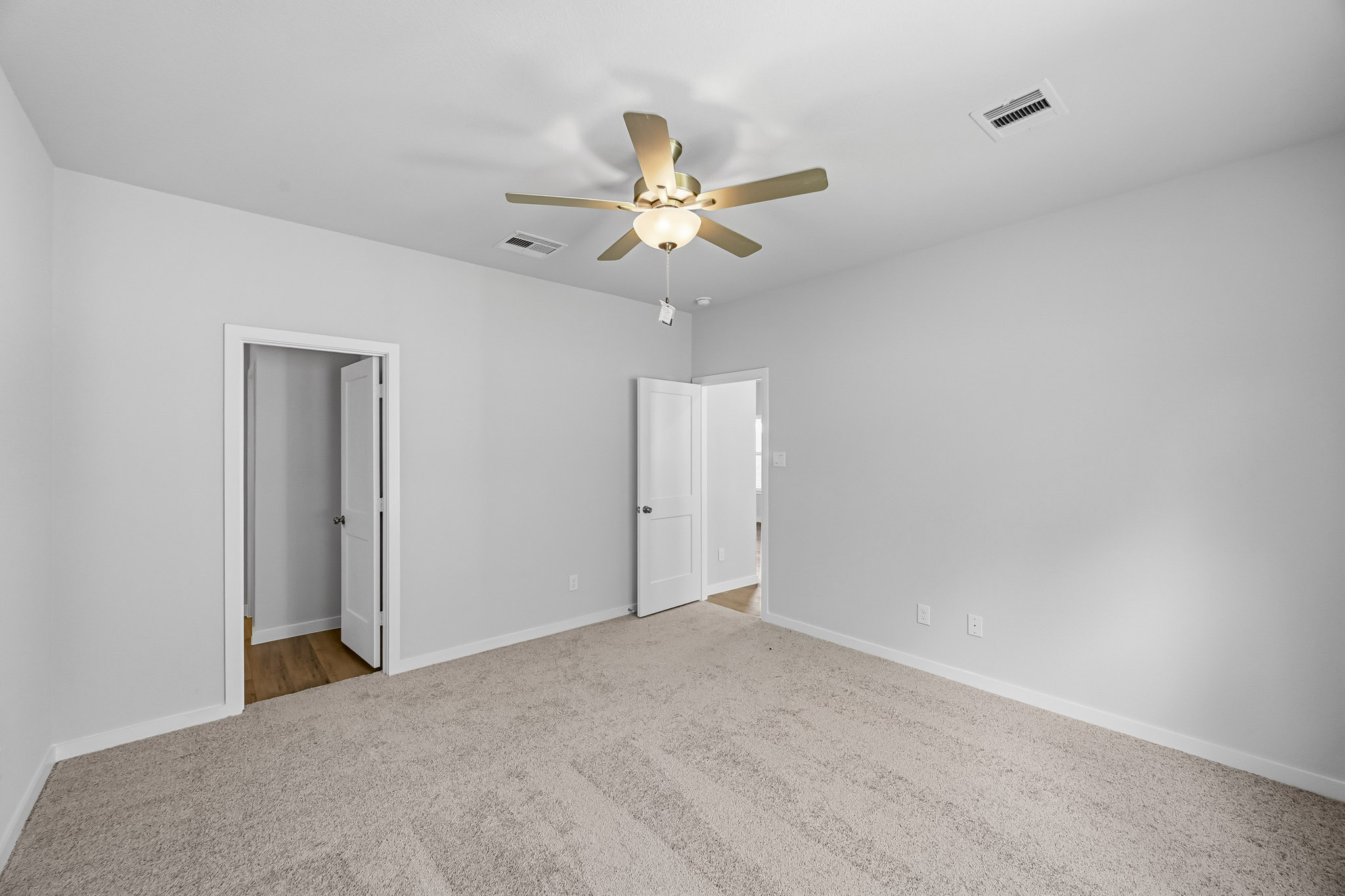 A ceiling fan in a room.