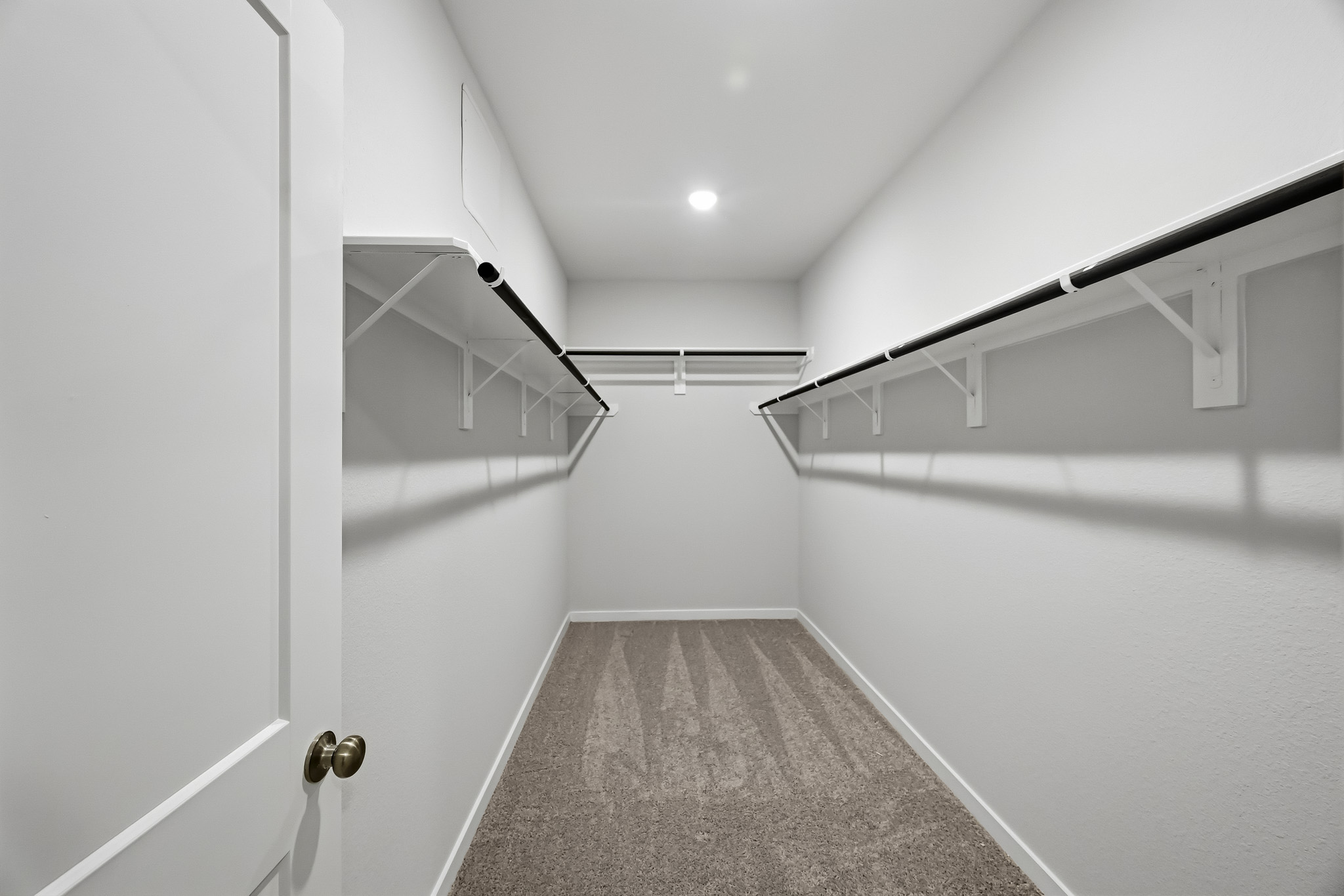 A white hallway with white walls.
