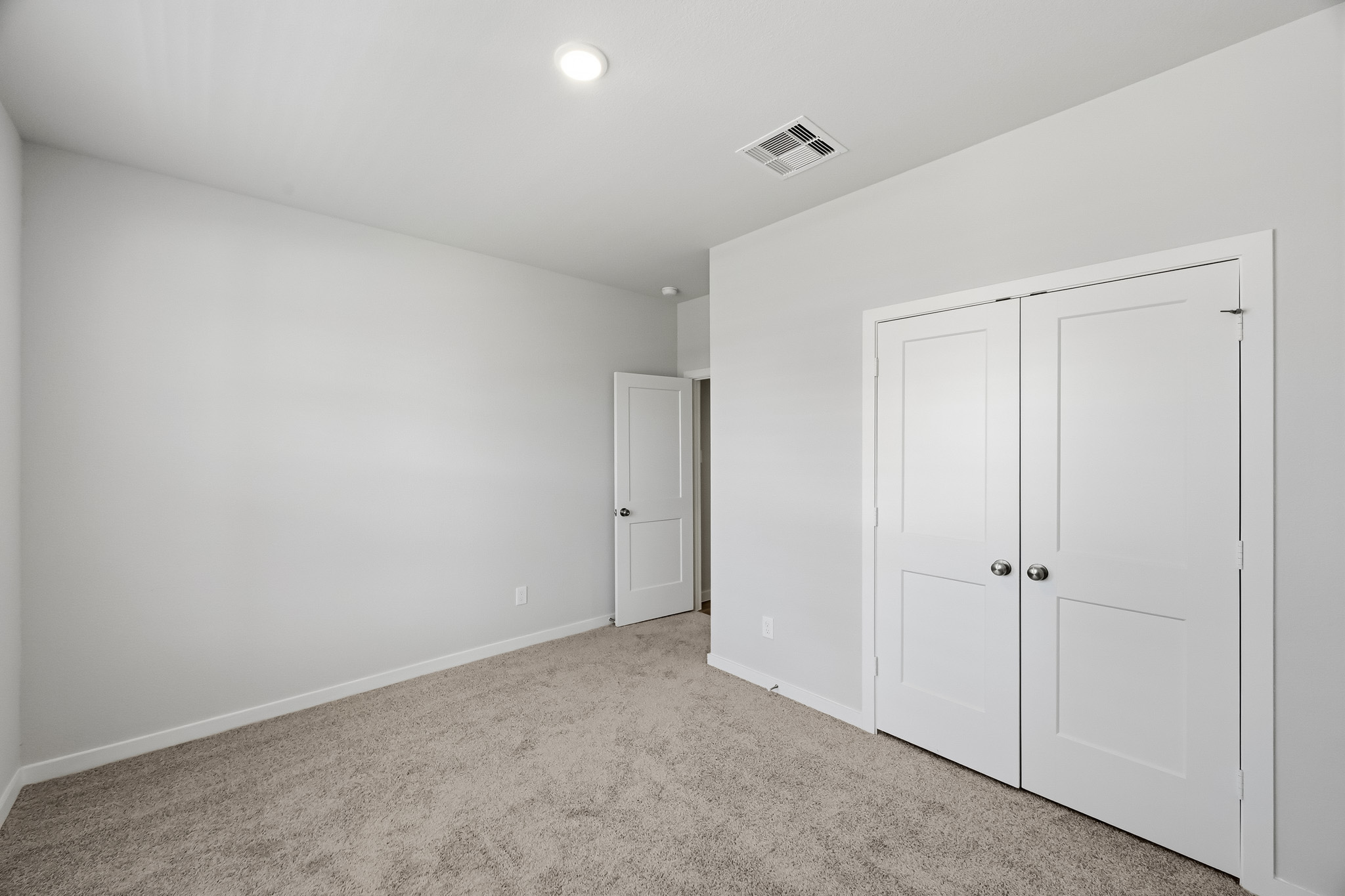 A room with white doors.