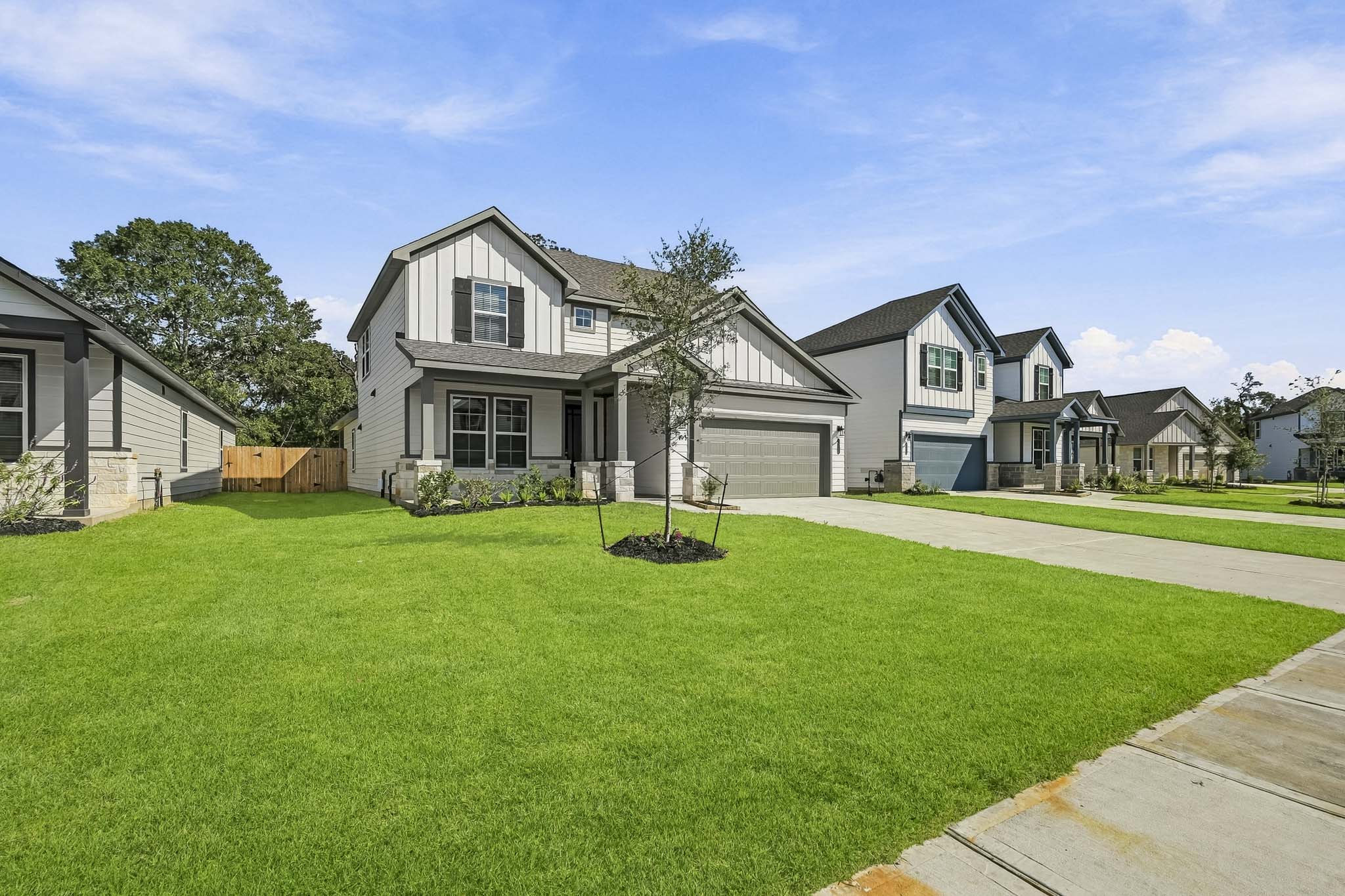 A large house with a lawn.
