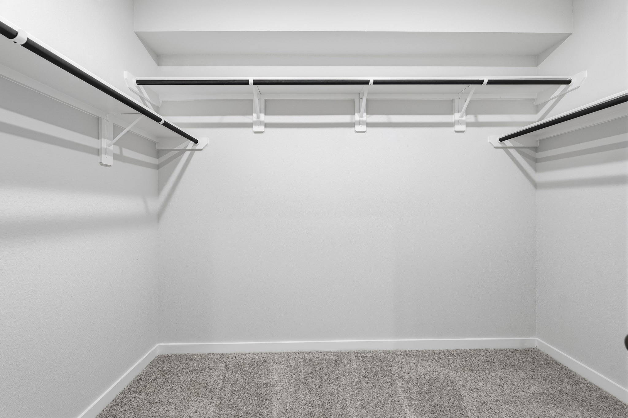 A staircase with a carpet.