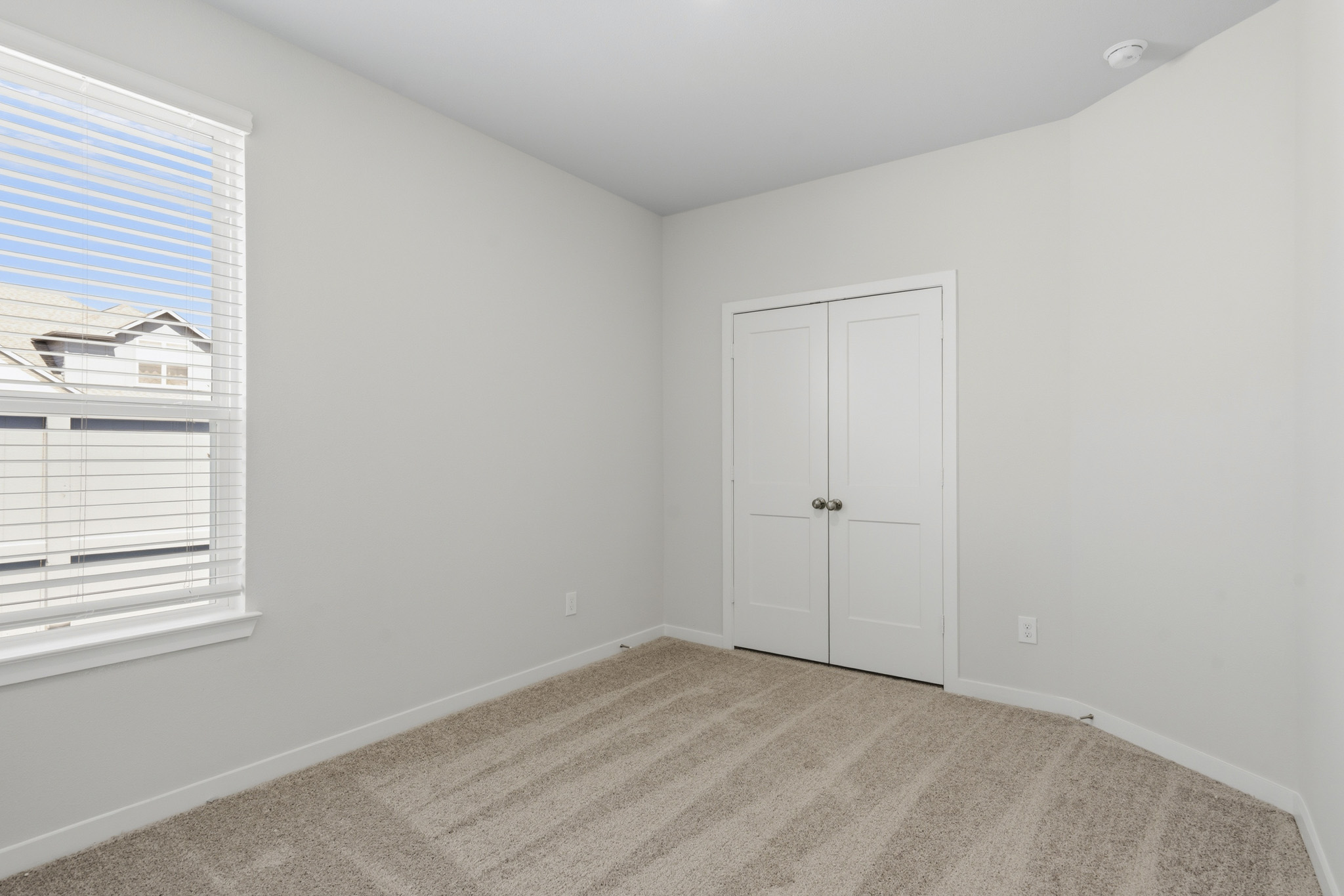 A room with white doors.