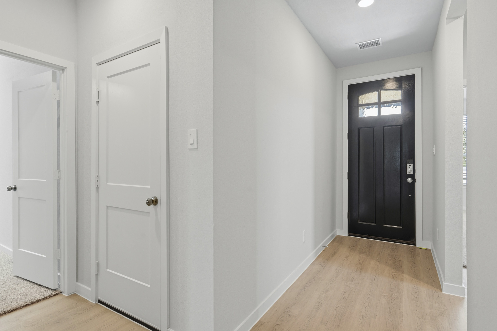 A room with white doors.