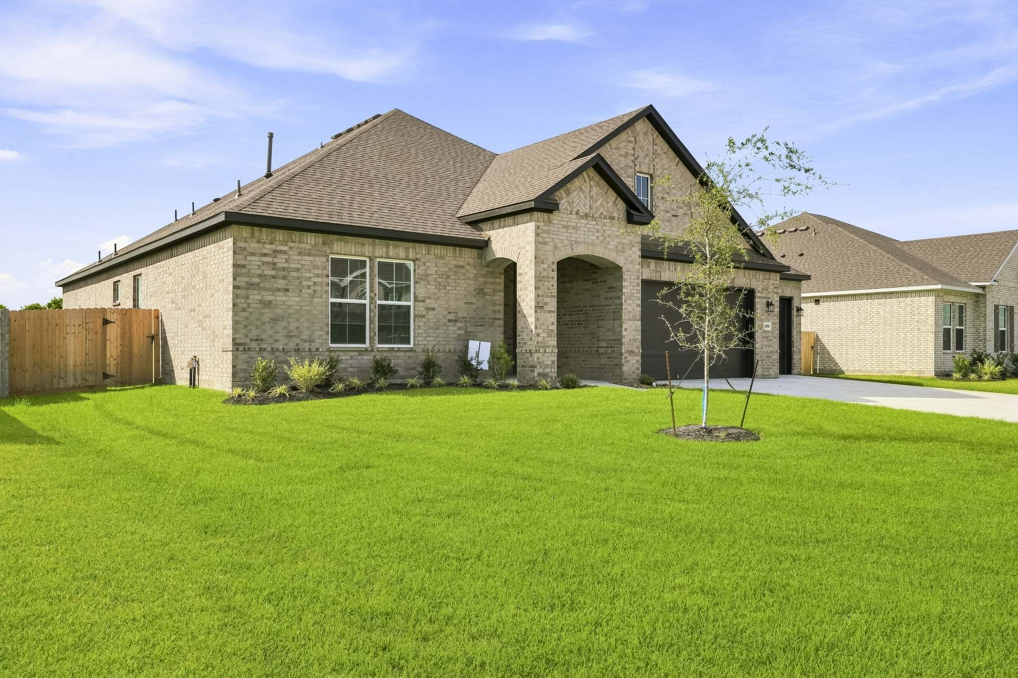 A large house with a yard.