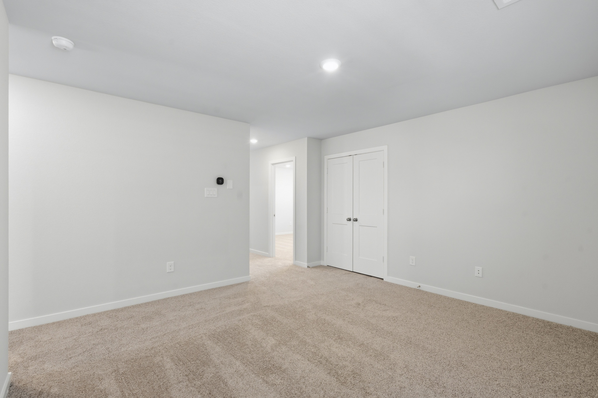 A room with white doors.