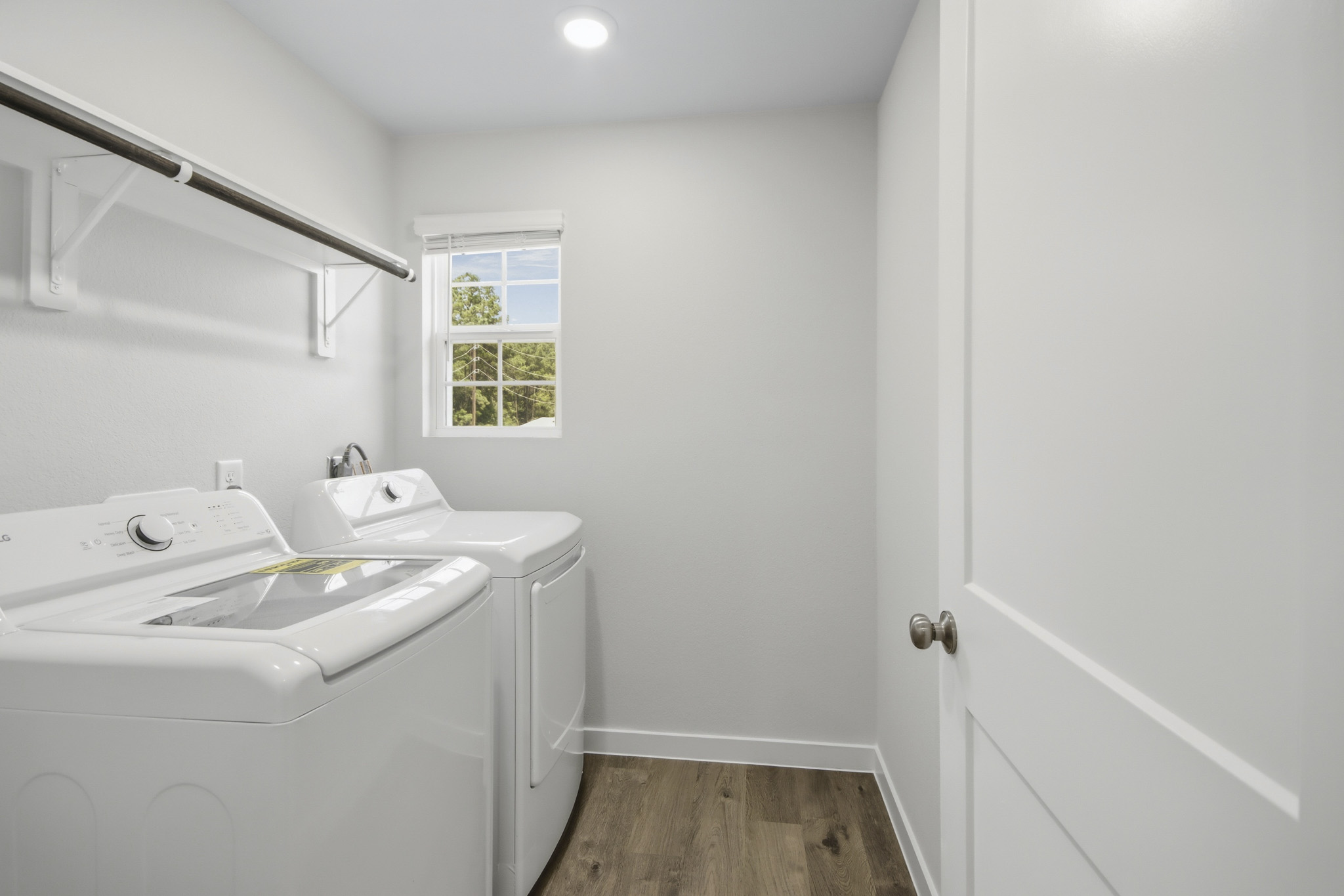 A bathroom with a tub and sink.