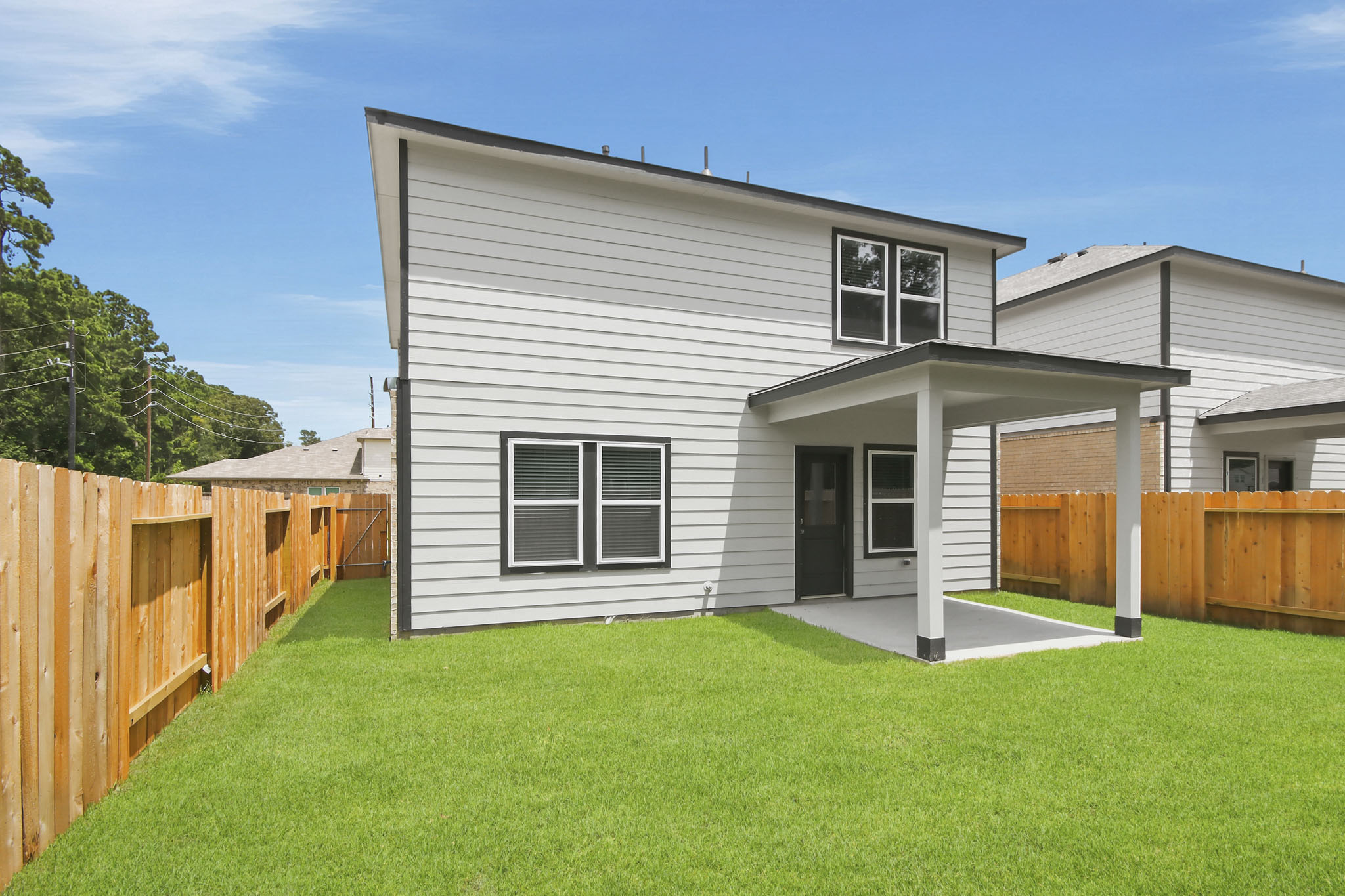 A house with a fence around it.