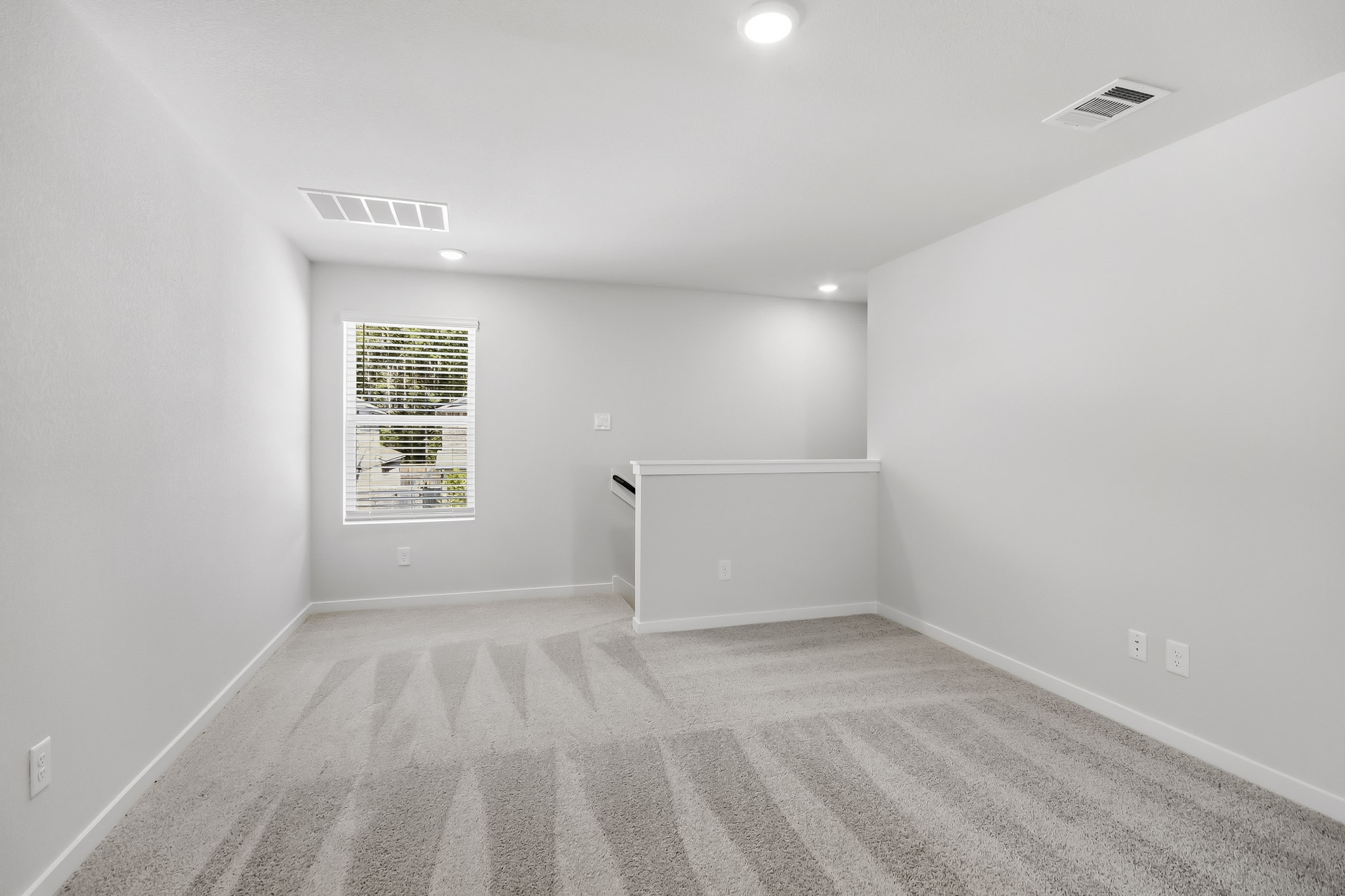 A room with a sign on the wall.