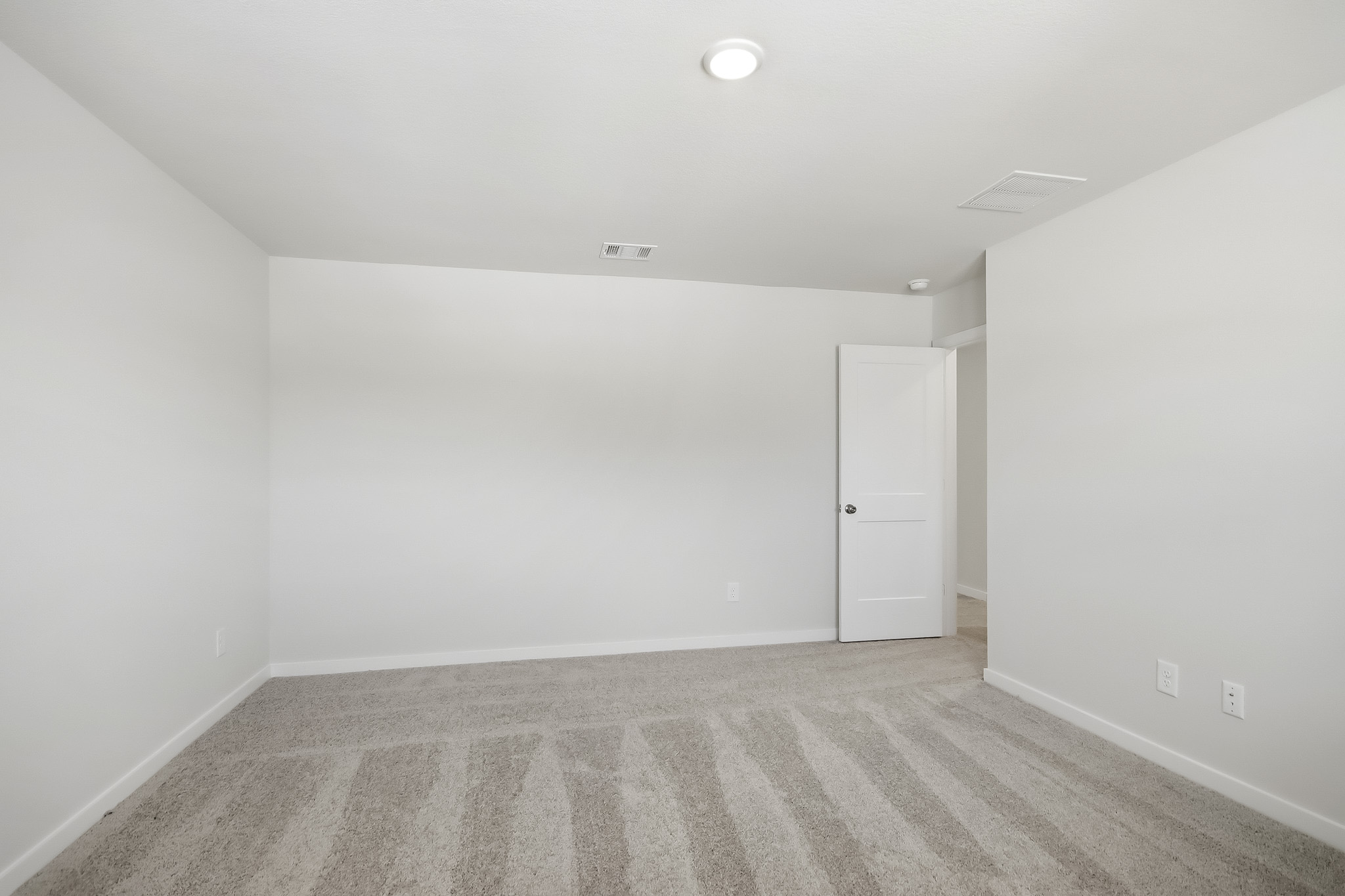 A room with white walls.