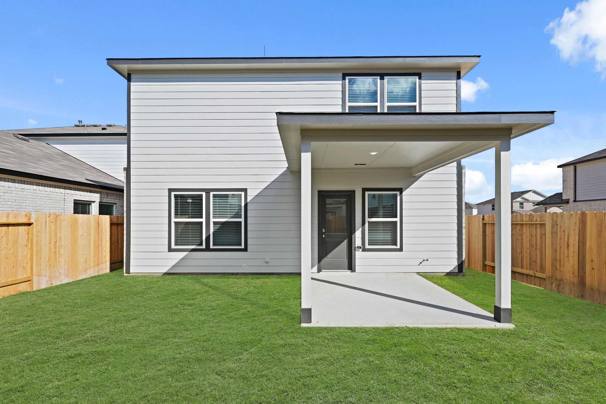 A house with a fence around it.