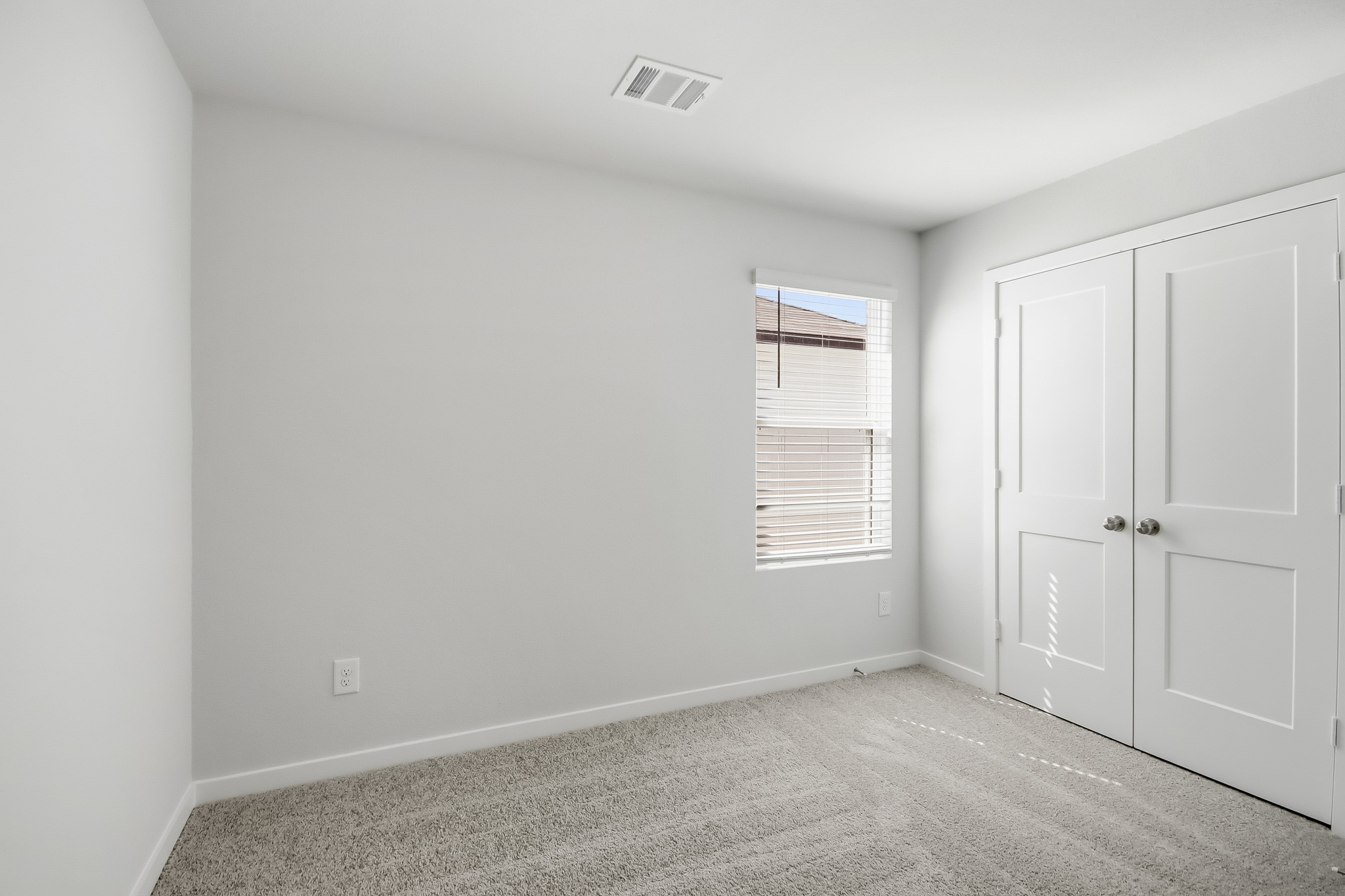 A room with white doors.
