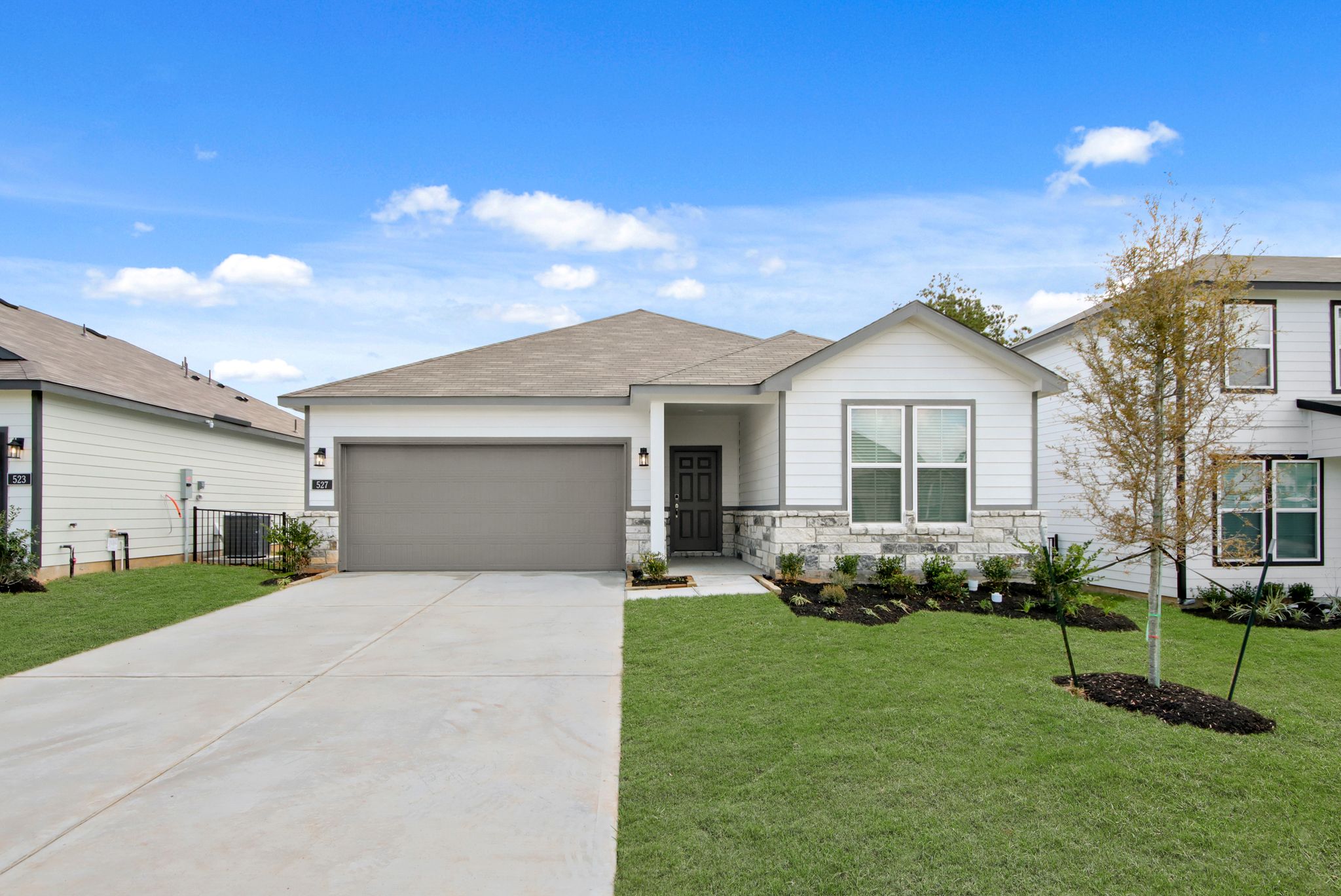 A house with a driveway.