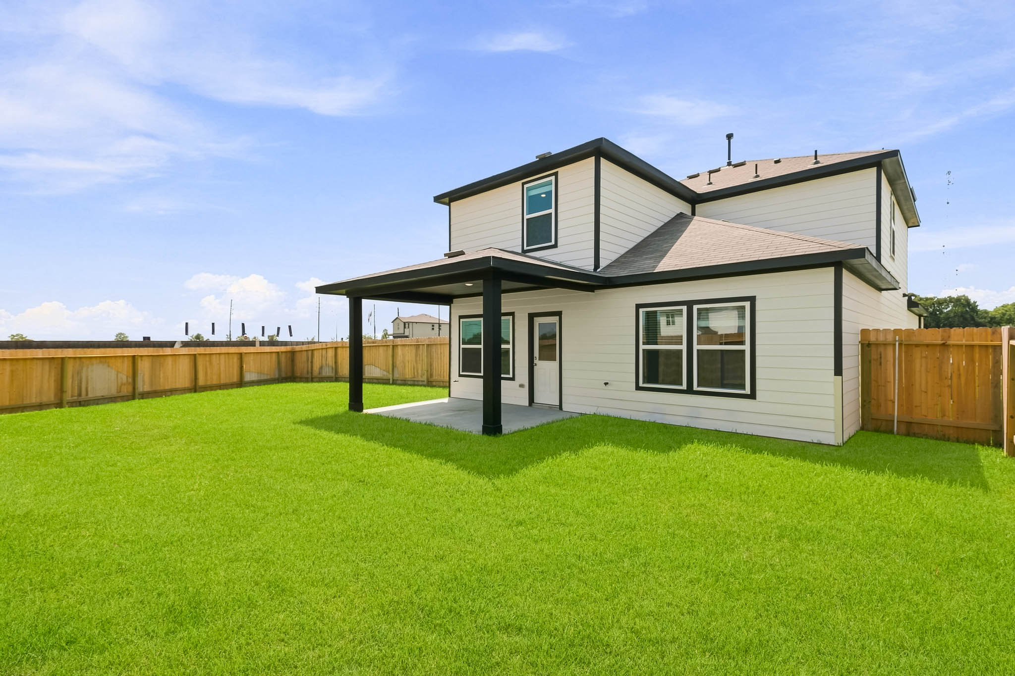 A house with a fence around it.