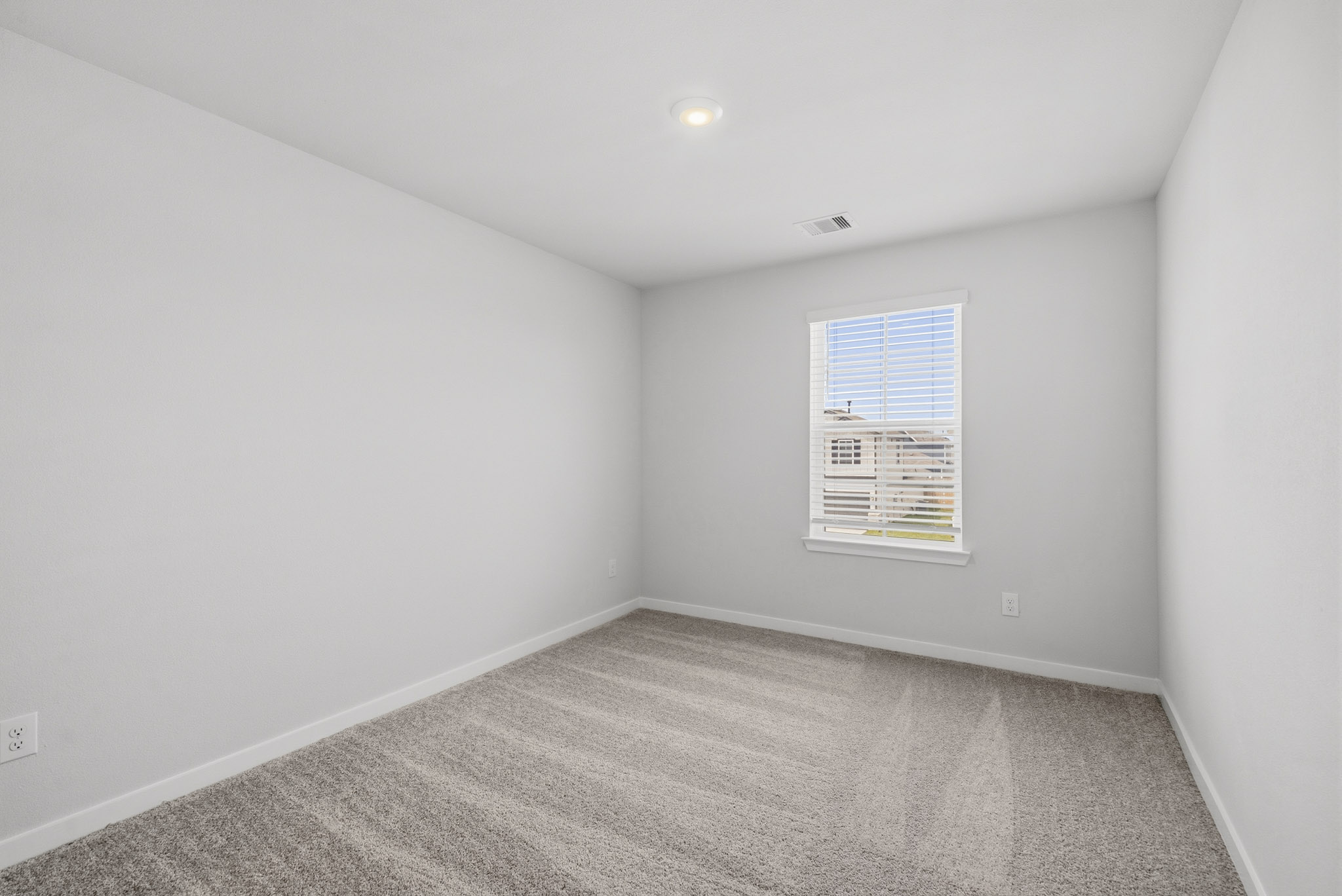 A room with a sign on the wall.