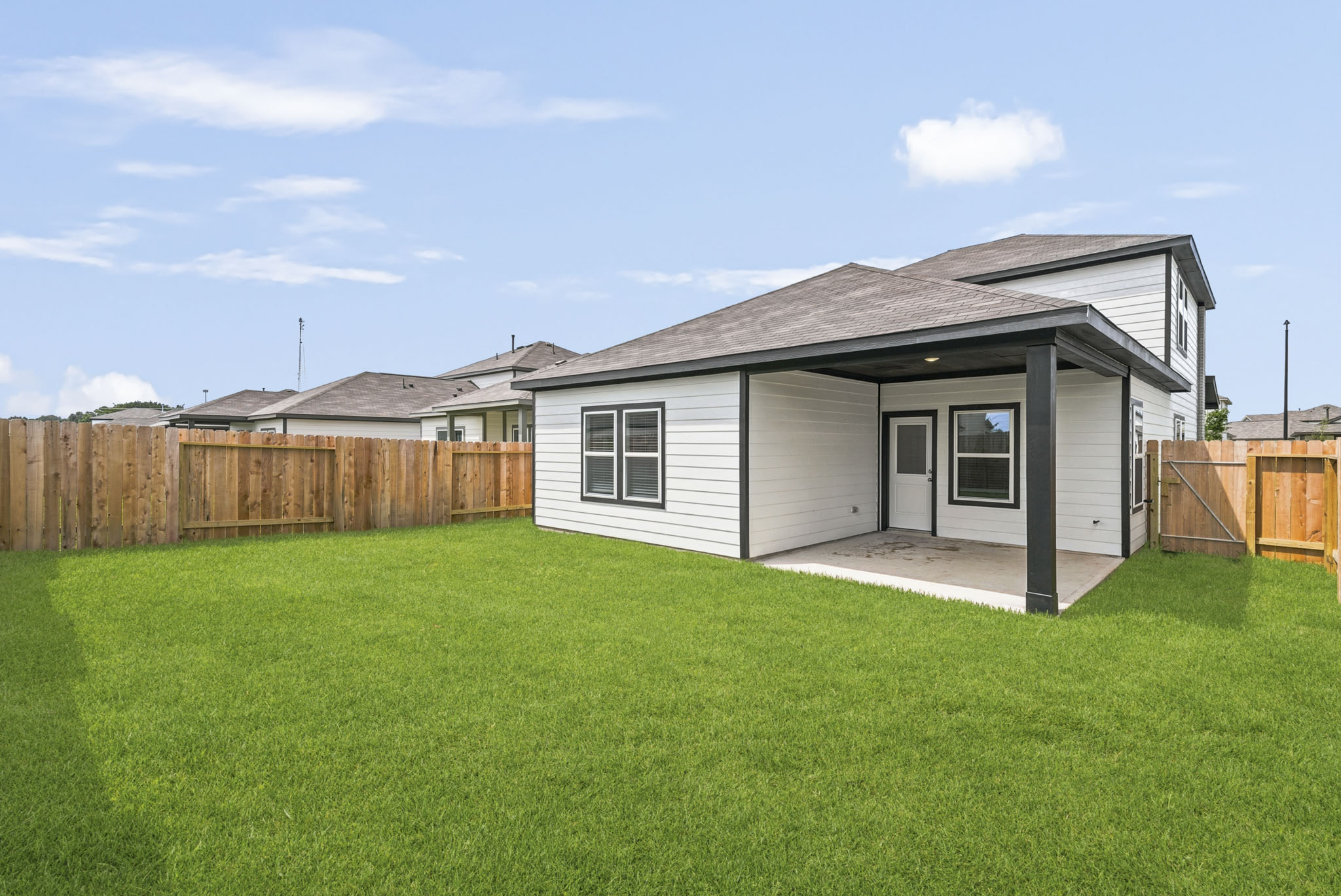 A house with a fence around it.