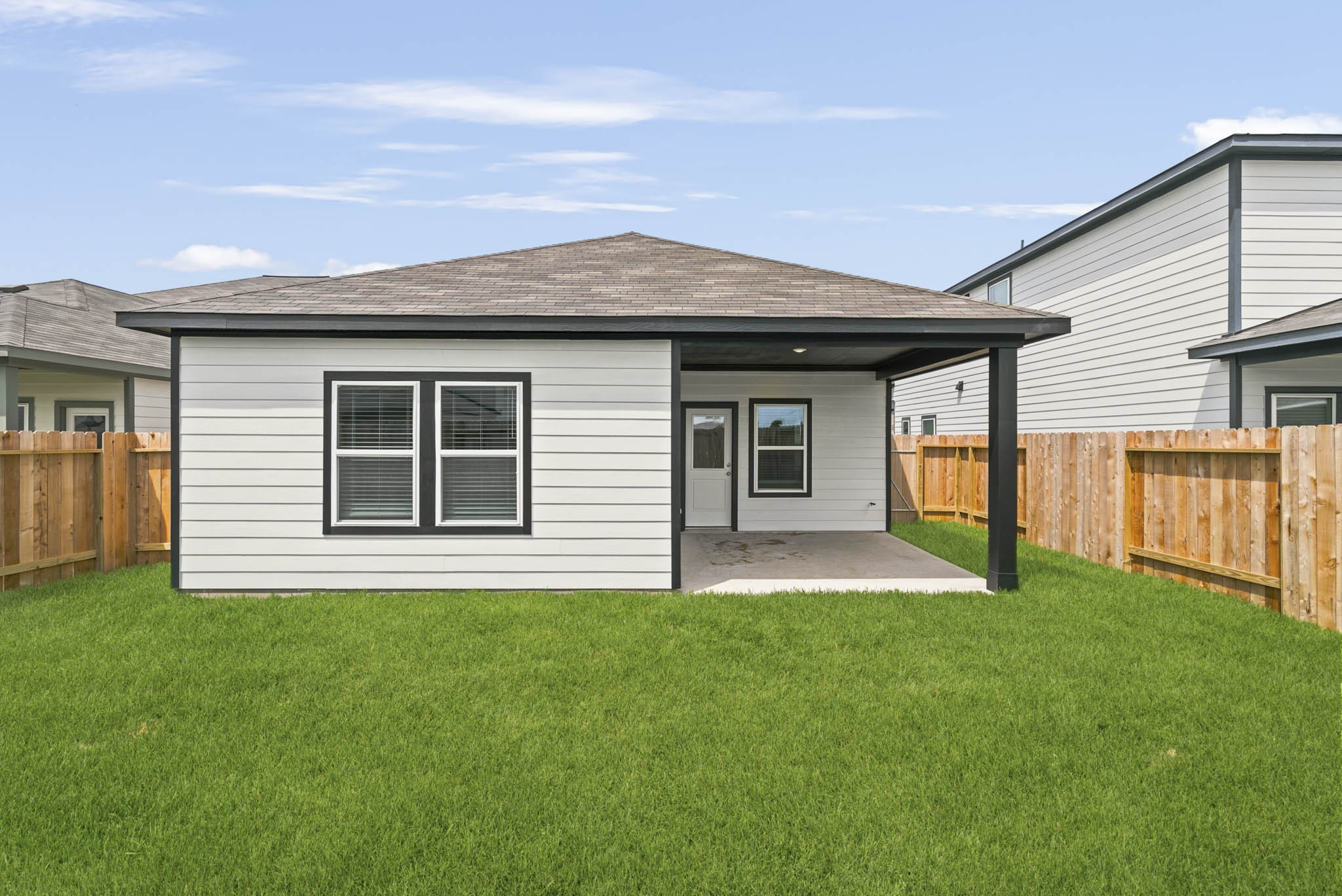 A house with a fence around it.