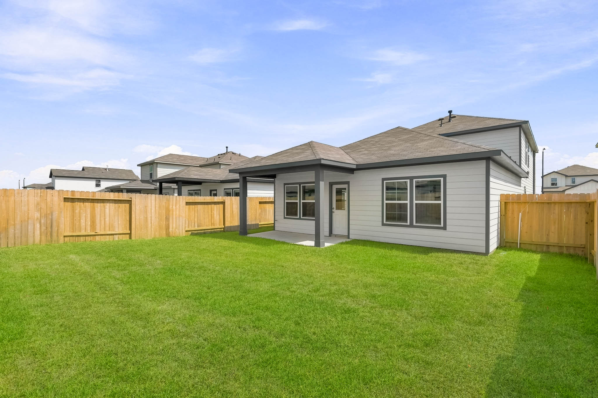 A house with a fence around it.