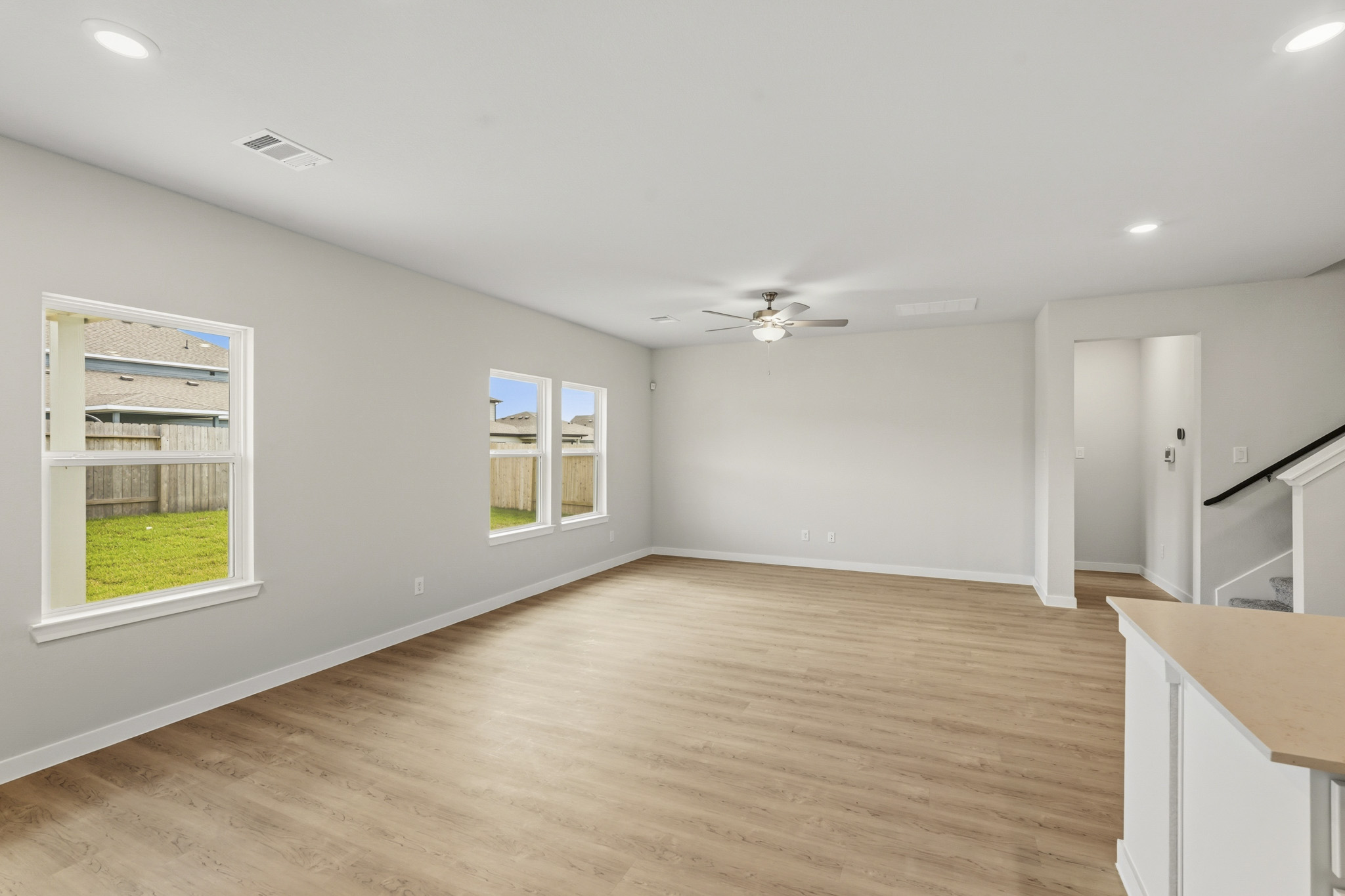 A room with a wood floor and a wood floor with a wood floor.